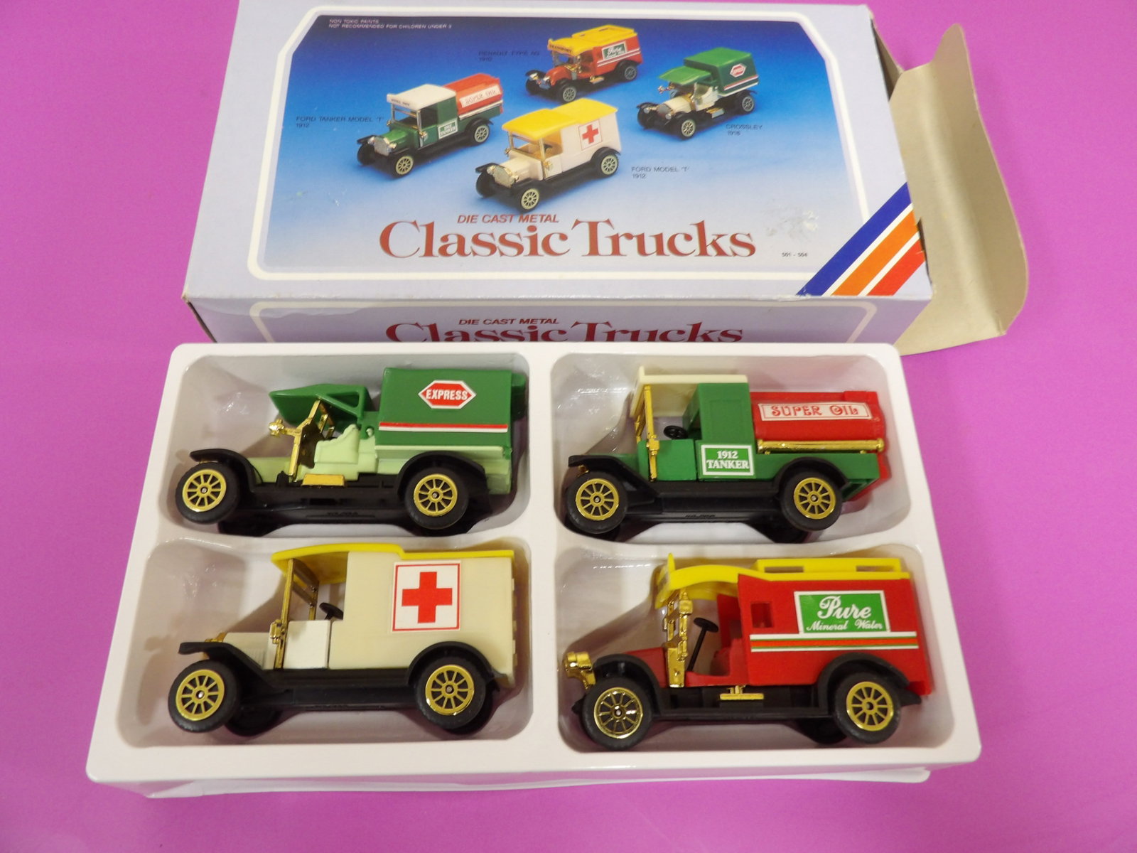 a set of 4 die-cast metal classic trucks Ford model T vehicles: 9.5 inches length box. Includes tanker, ambulance and delivery trucks. We will inhouse ship items to you very affordable and efficient. Select self-arrange shipping.