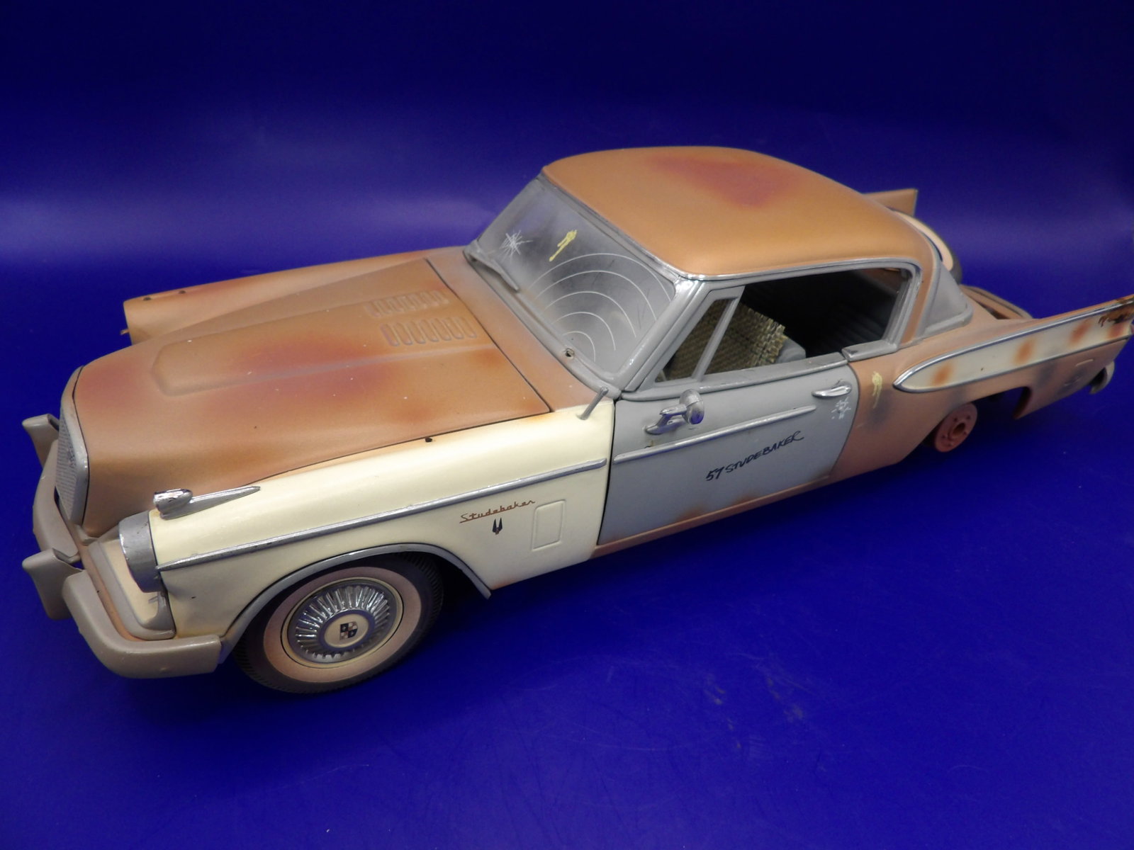 1:18 1957 Studebaker Golden Hawk project car: 11 inches length. Since this is a project car, missing parts are probably original. We will inhouse ship items to you very affordable and efficient. Select self-arrange shipping.