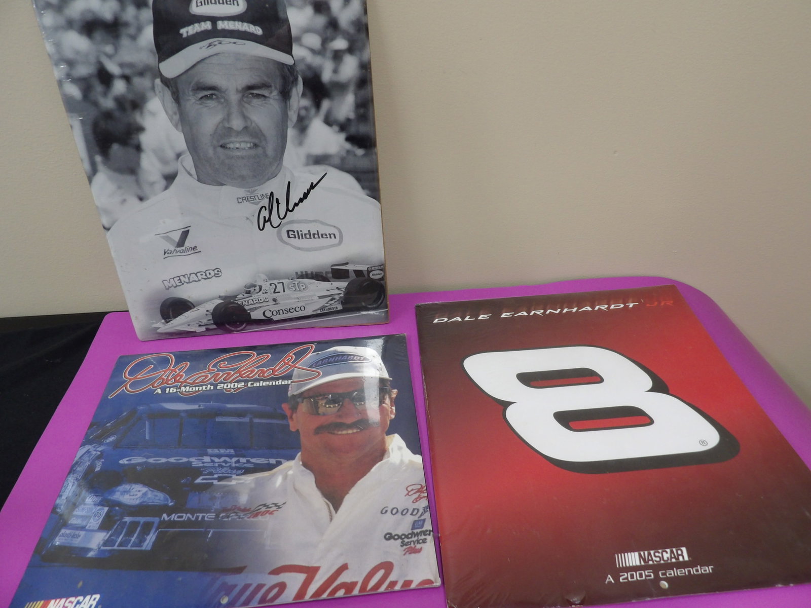 lot of 3 unopened Nascar calendar and picture: Taller one is 14 inches height. All are unopened in original packaging.