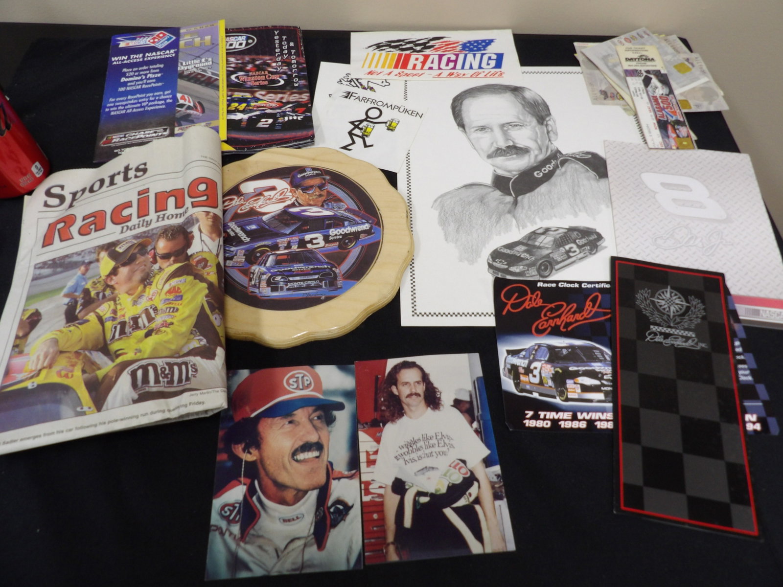 Collections of sports memorabilia for Nascar legends: Including pictures, wooden plaque, brochures, newspaper and old game tickets. We will inhouse ship items to you very affordable and efficient. Select self-arrange shipping.