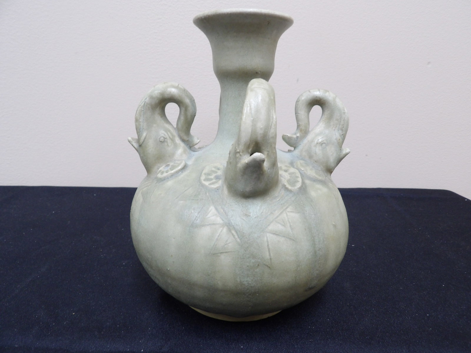 Sukhothai-style celadon glazed stoneware rhyton jar with elephant handles: Approx. 7 inches height.