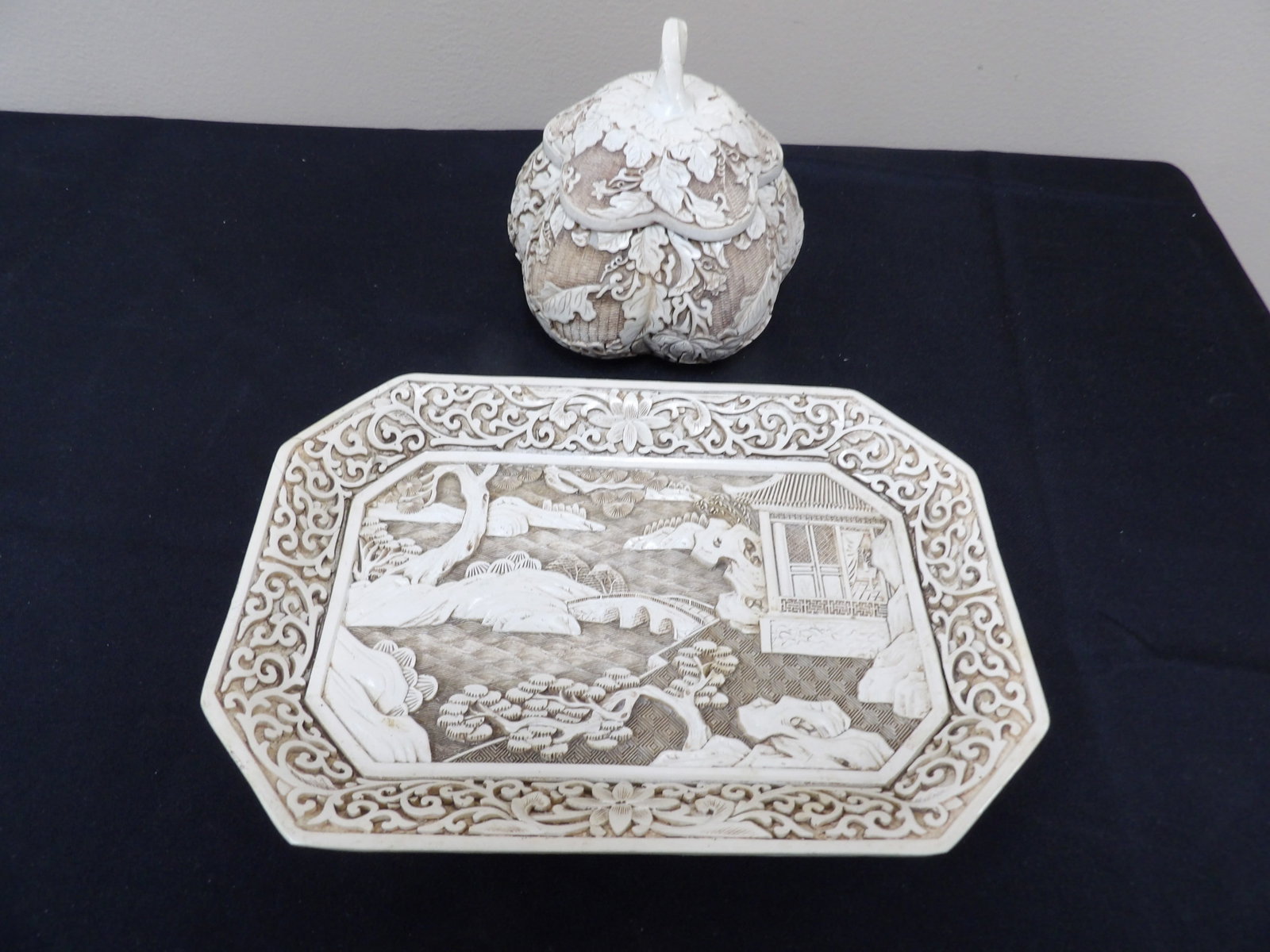 Ivory Dynasty brand cinnabar style lidded box and tray set with floral and scenic motifs: Tray is 9.5 inches length. Box is approx 5 inches height.