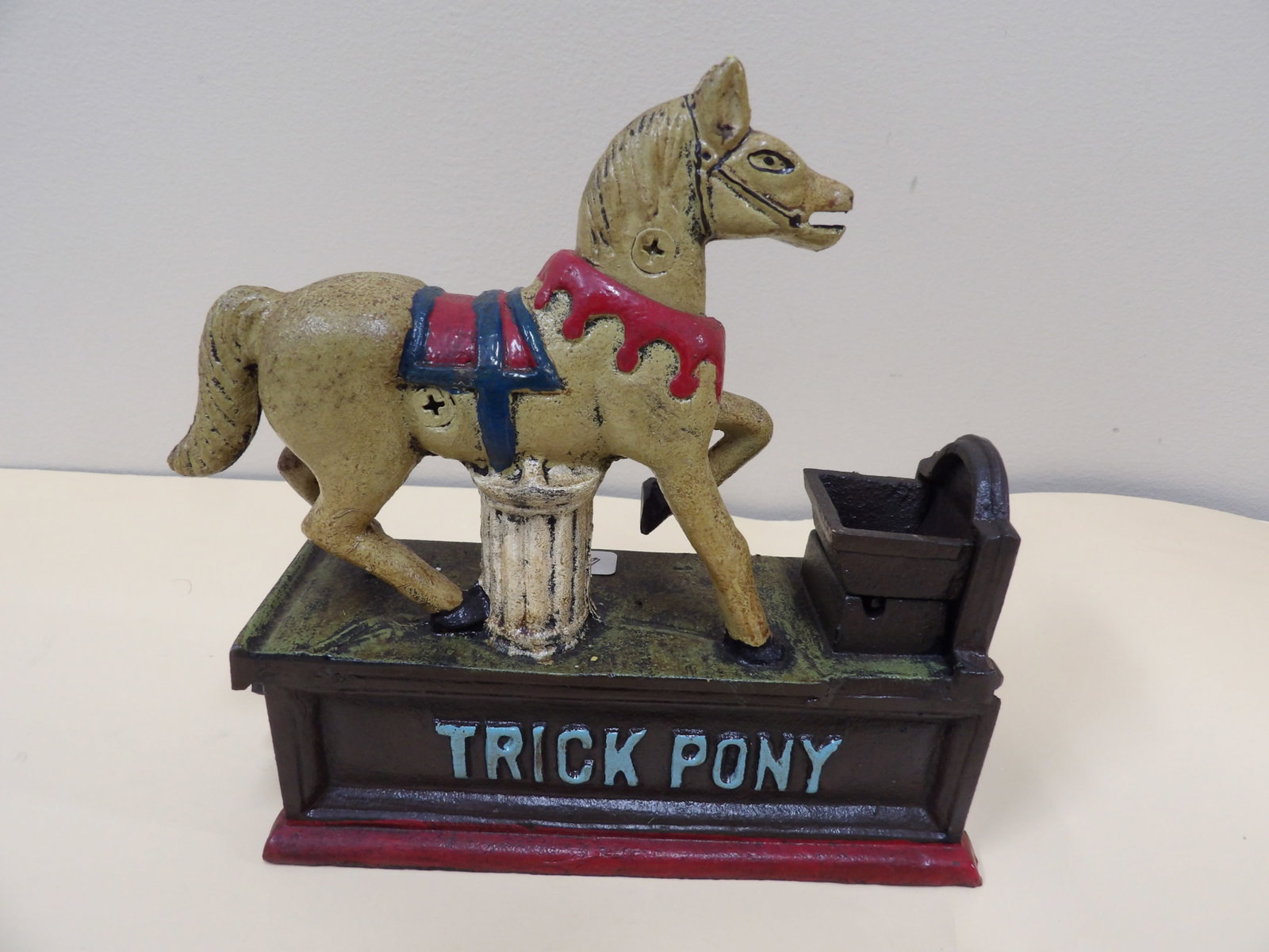cast iron "Trick Pony" mechanical coin bank: Approx. 7 inches length.
