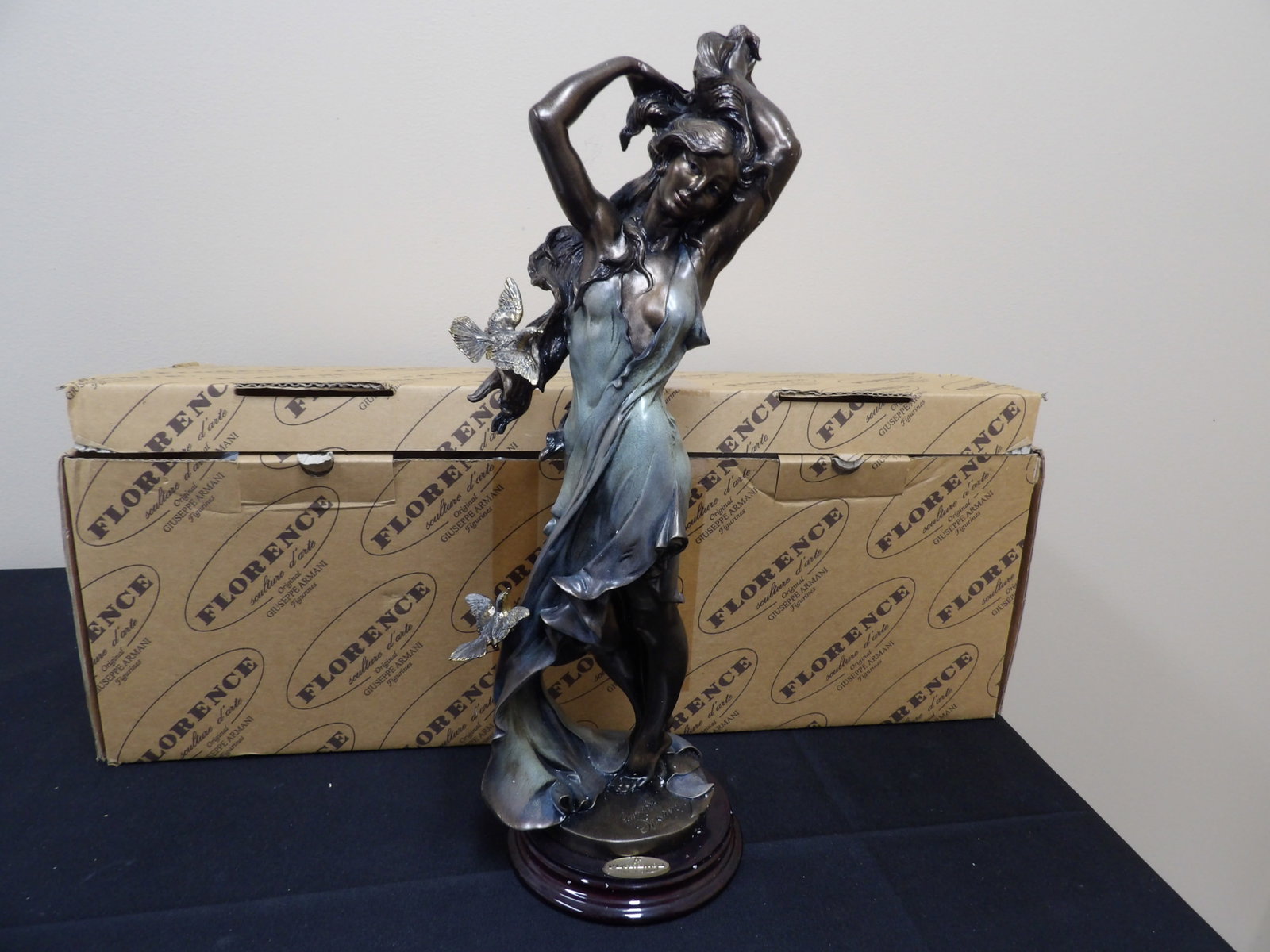 Italian hand signed by G. Armani Ragazza Con Colombe Aurora in original box: Like new condition in original box. 16.2 inches height statue in approx. 22 inches length box.