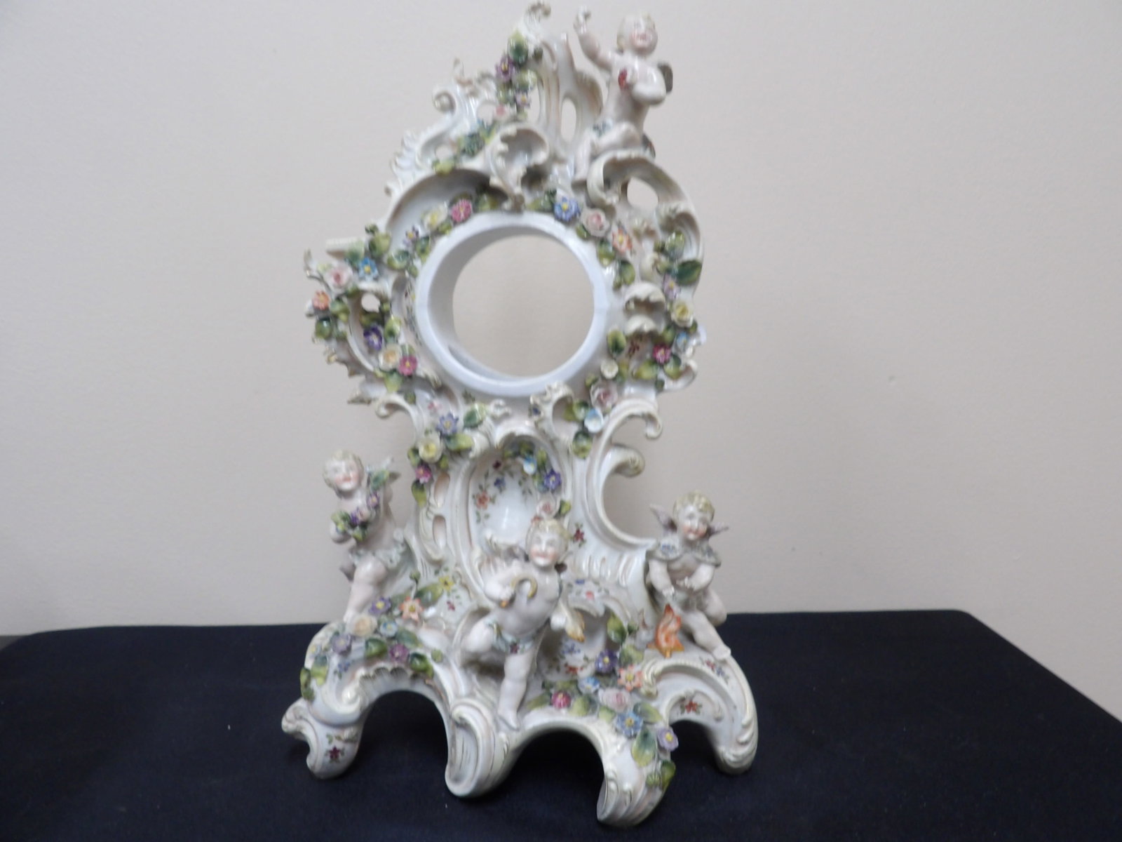 ornate Rococo Meissen style antique porcelain clock case with cherubs and floral motifs: 14.4 inches height. We will inhouse ship items to you very affordable and efficient. Select self-arrange shipping.