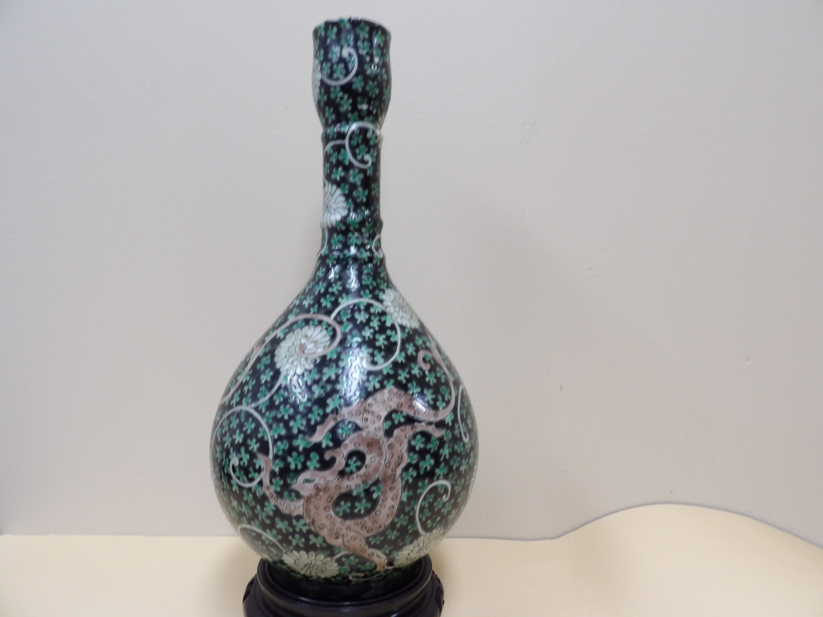 rare Chinese porcelain black ground Tianqiuping vase with dragon and floral motifs: 14 inches height. We will inhouse ship items to you very affordable and efficient. Select self-arrange shipping.