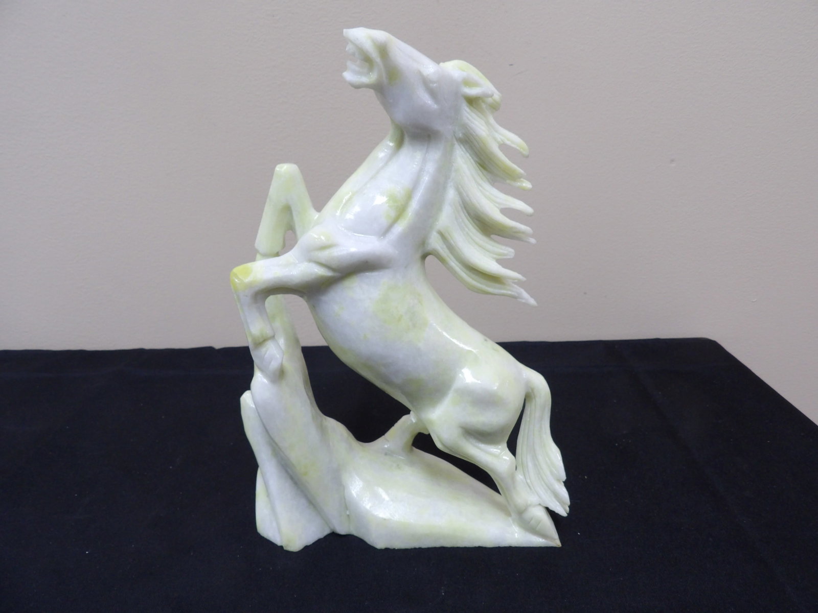 Chinese jade or stone carved running horse on a rocky base sculpture: 10.2 inches height. 2156 grams. We will inhouse ship items to you very affordable and efficient. Select self-arrange shipping.