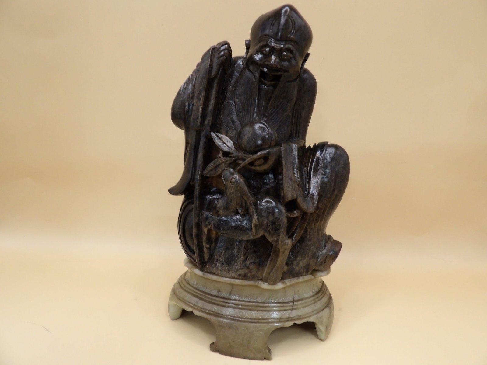 fine Chinese carved stone sculpture of a wise man with peach and deer on carved stone base: 8 inches height including stone base. We will inhouse ship items to you very affordable and efficient. Select self-arrange shipping.