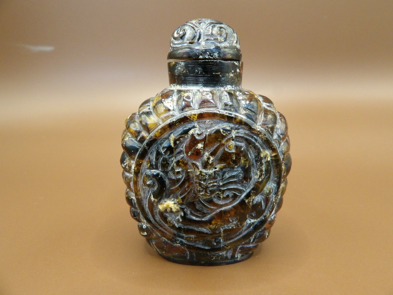 Chinese antique amber snuff bottle: 2.4 inches height.