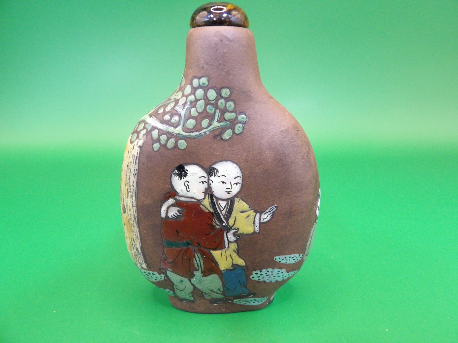 Chinese Yixing enamel painted snuff bottle with 5 children playing scene: 2.4 inches height.
