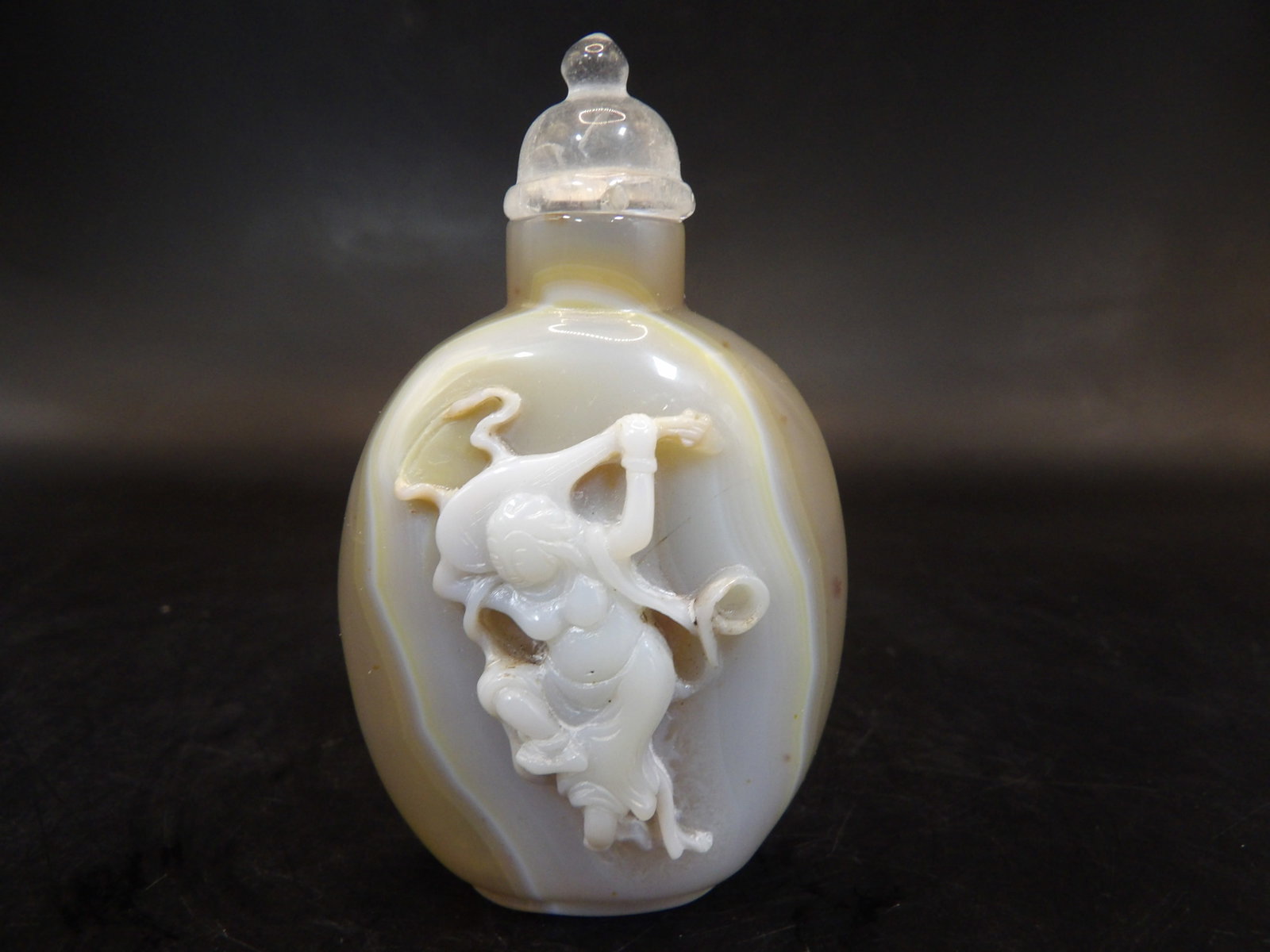 very fine carved Chinese well hollowed agate snuff bottle with Tang dynasty style dancing woman moti: 2.7 inches height.