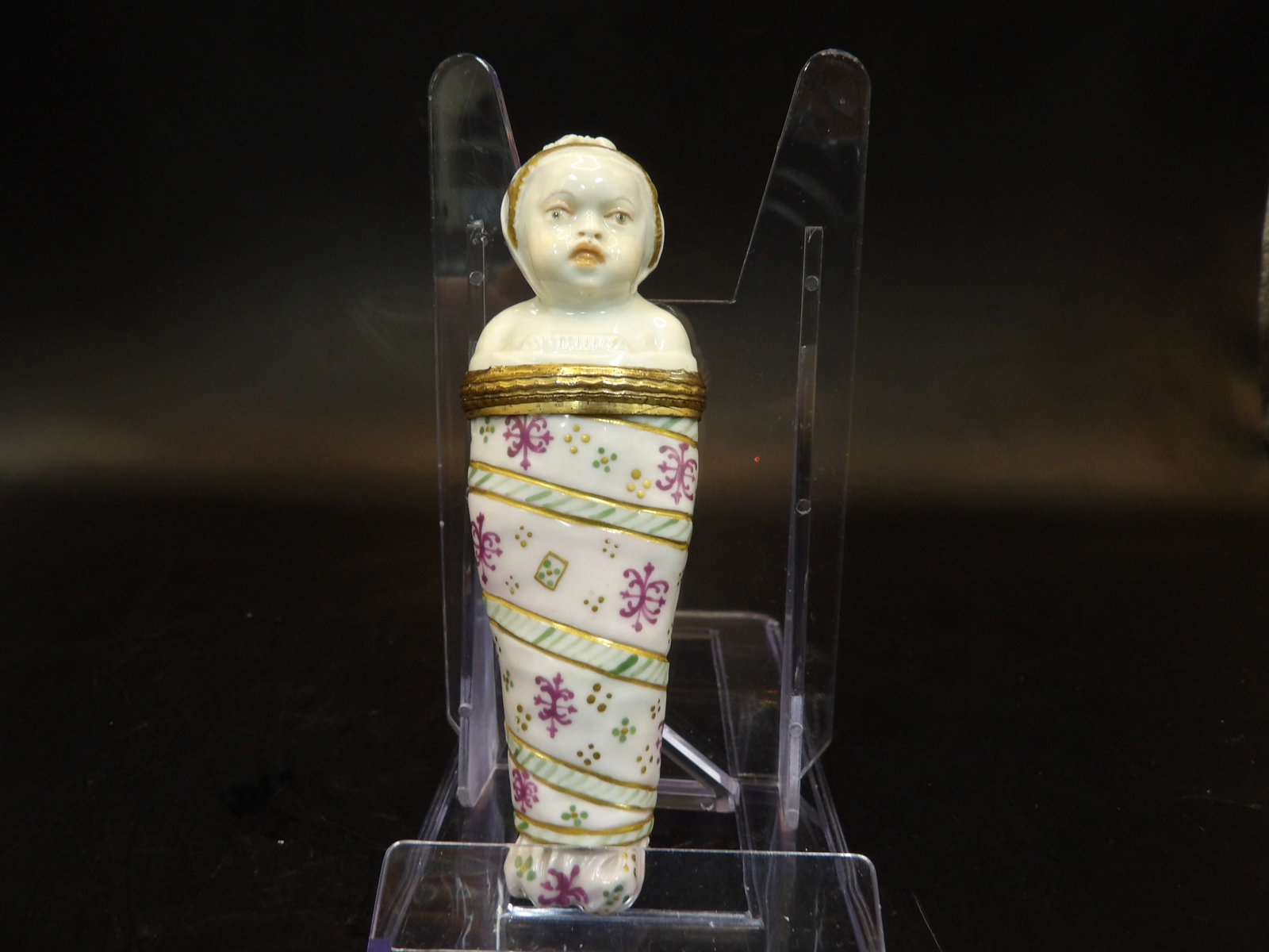 antique Meissen style porcelain sewing bottle in the form of an infant in swaddling clothes: 4 inches height.
