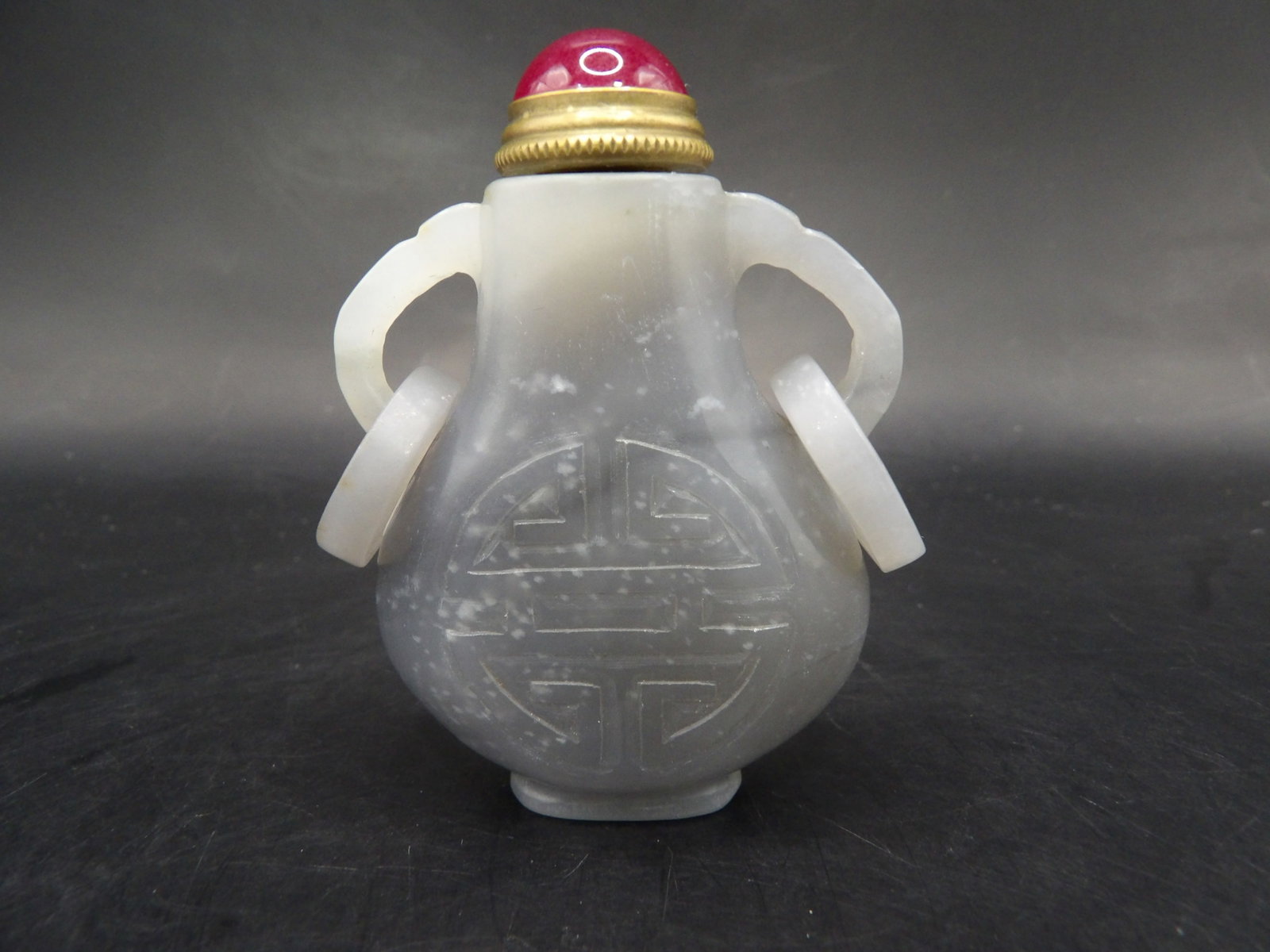 Chinese carved nephrite jade snuff bottle with rings and Longevity symbol: 2.2 inches height.