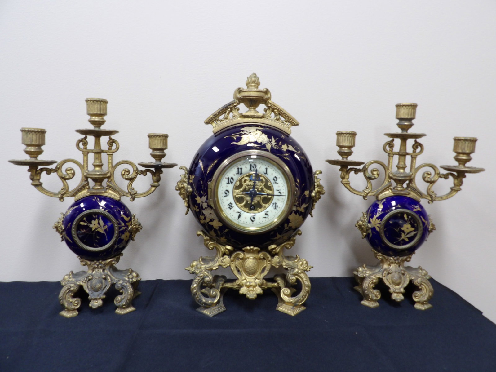 Lot of 3 antique cobalt blue porcelain candle holders and clock set gold gilt: Clock is 15 inches height. We will inhouse ship items to you very affordable and efficient. Select self-arrange shipping.
