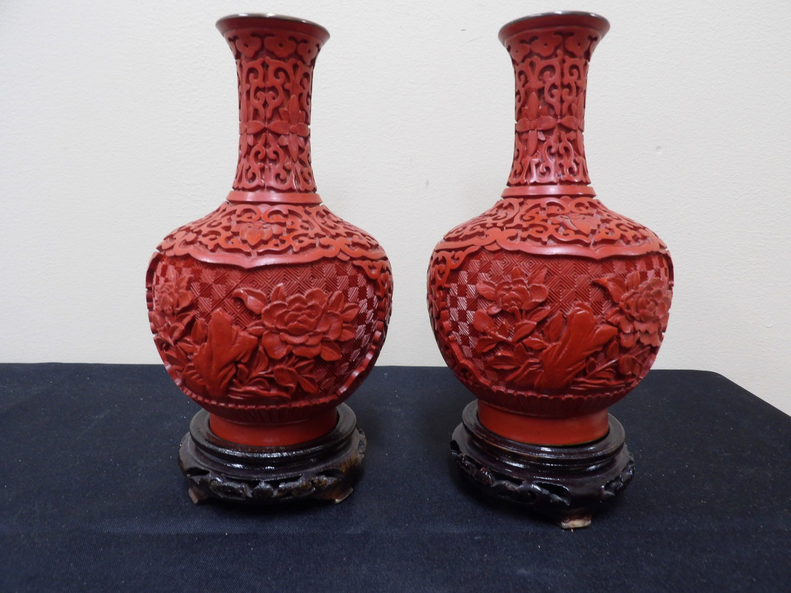 pair of Chinese floral pattern cinnabar brass vases with wood bases: 8 inches height including wood base. We will inhouse ship items to you very affordable and efficient. Select self-arrange shipping.