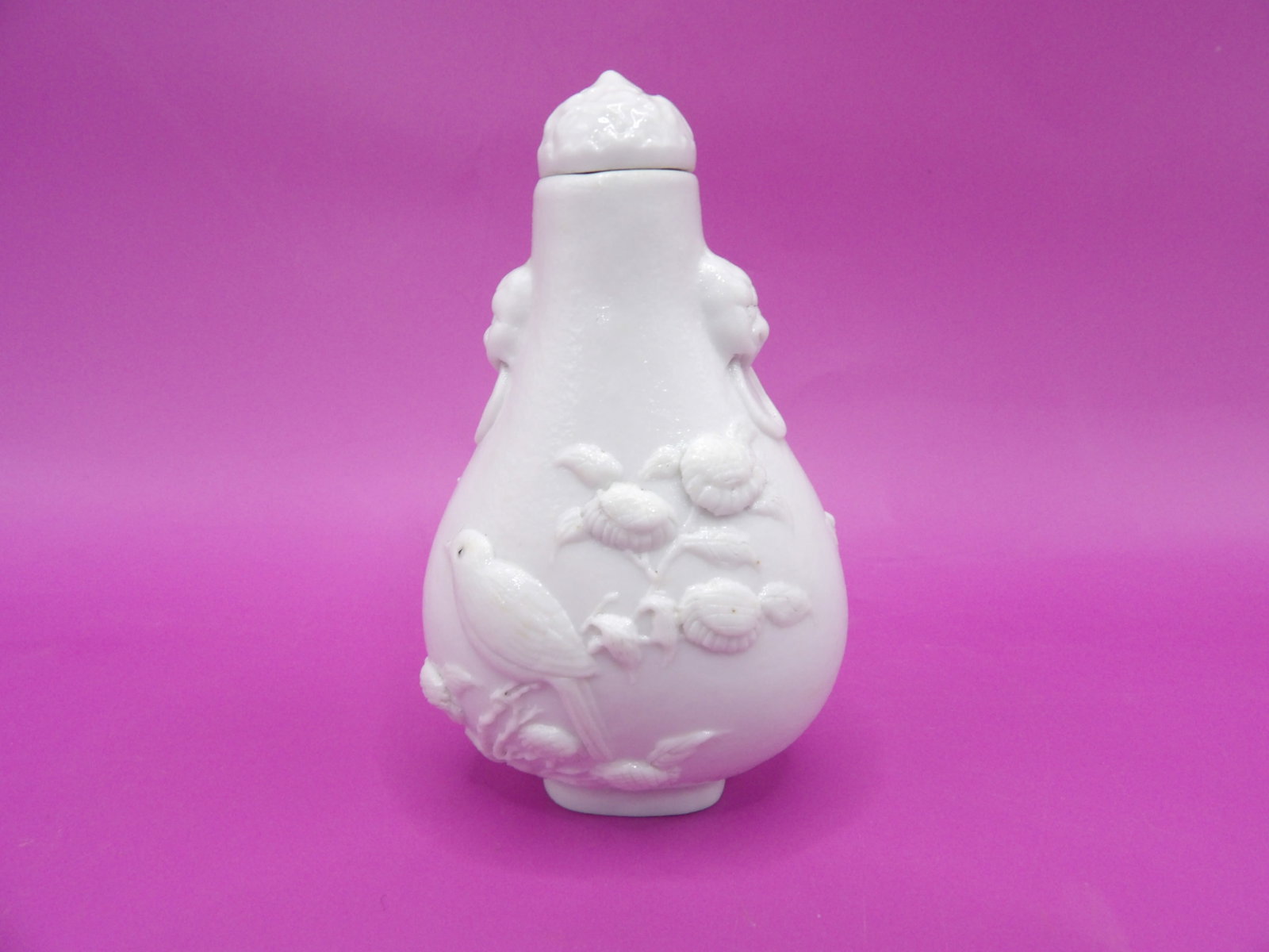rare Chinese antique molded porcelain snuff bottle with mask handles signed: 2.8 inches height.
