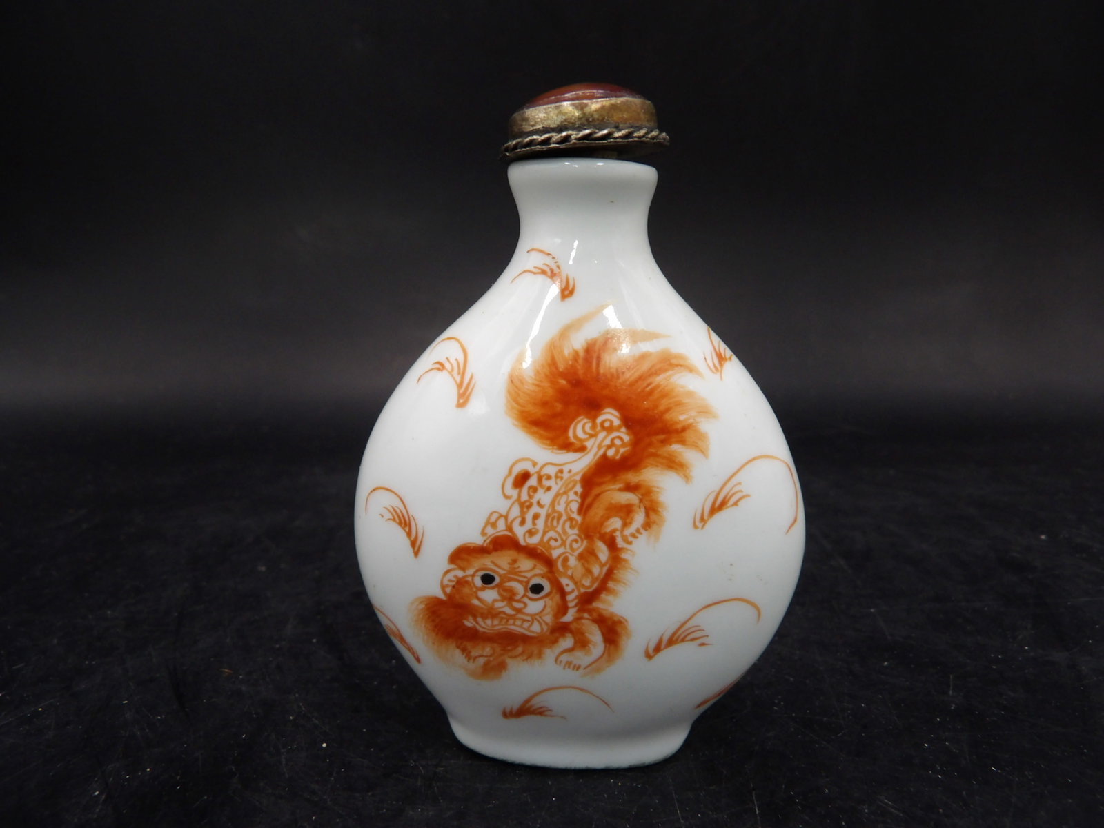 Chinese antique copper red foo dog porcelain snuff bottle: 2.8 inches height.
