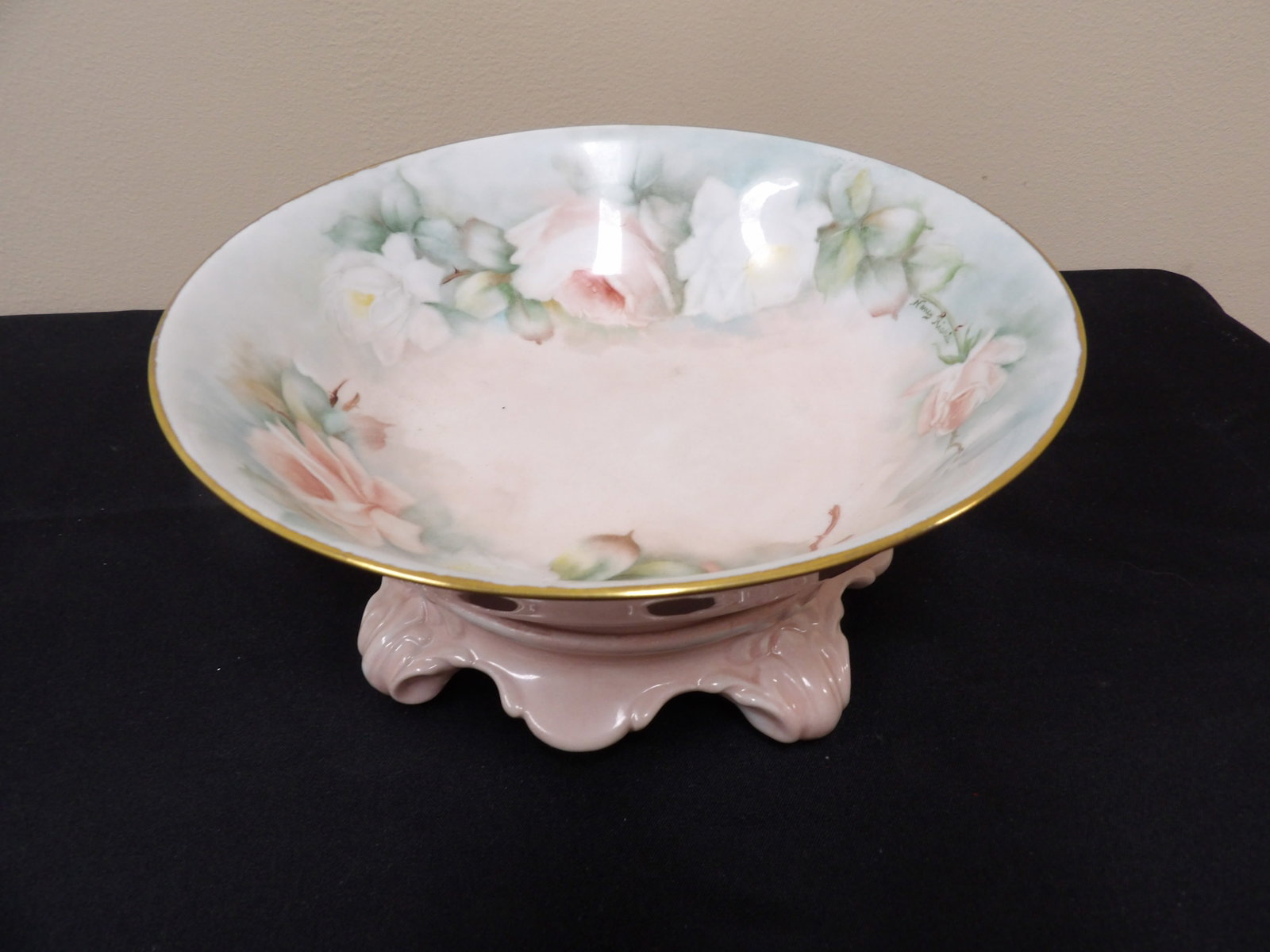 pink porcelain bowl with rose motif on porcelain stand: 9 inches bowl opening.