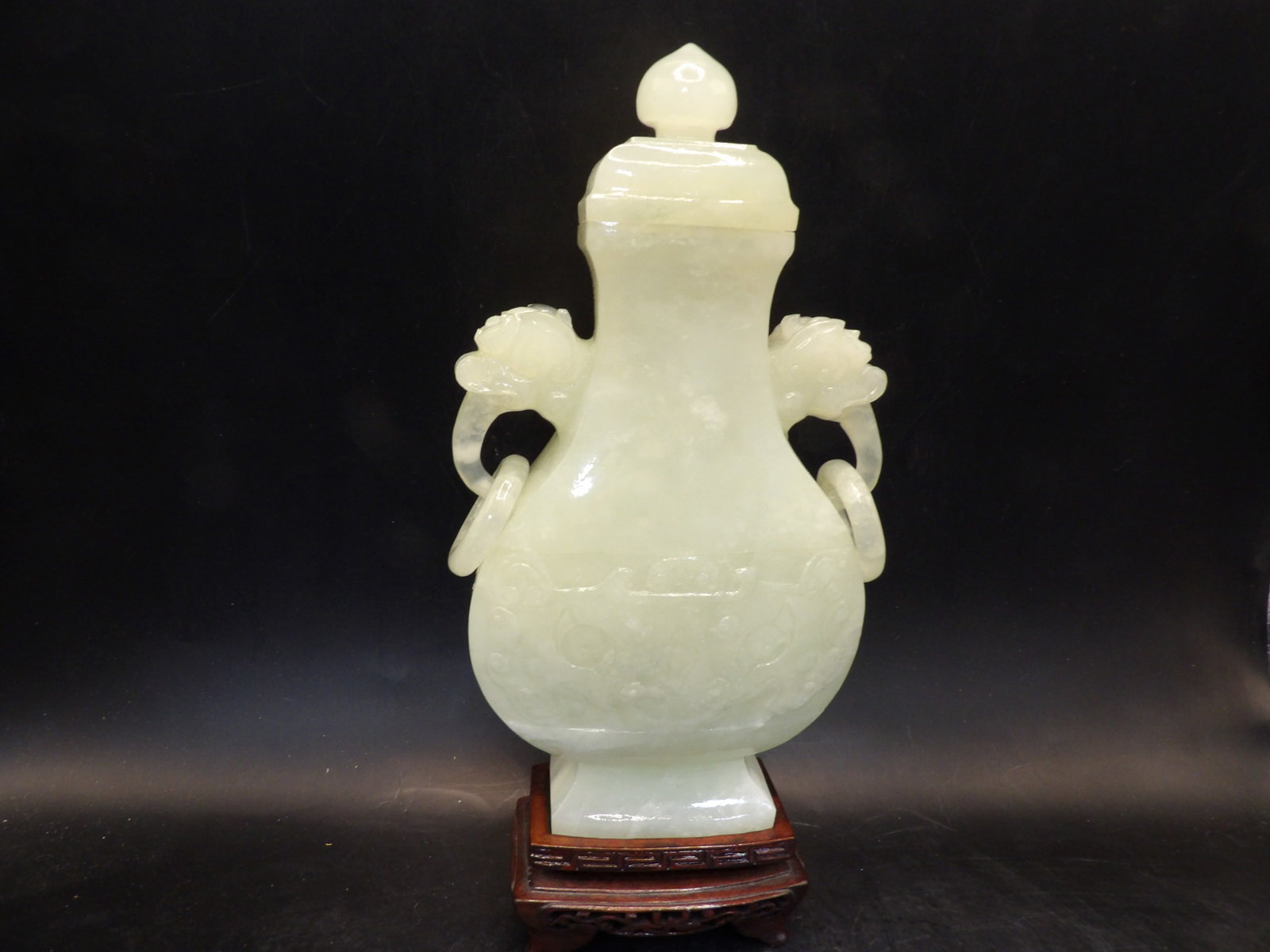 Chinese jade carved vase with lid beast ears and rings: 9.3 inches height including base. 943 grams.