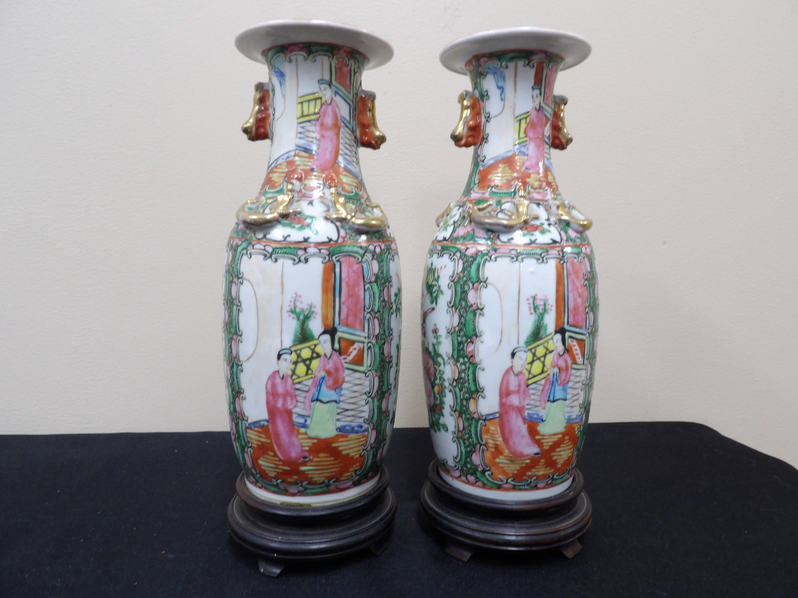 pair of antique famille rose porcelain vases with wood bases: Over 11 inches height including wood base.