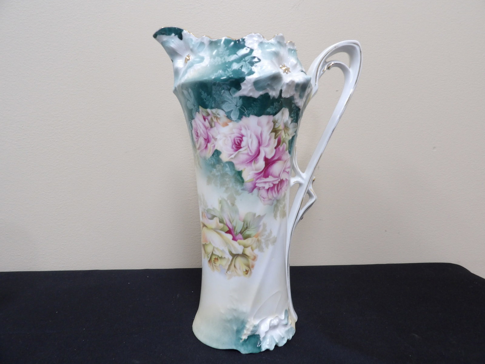 antique RS Prussia ornate porcelain pitcher in the carnation mold with pink roses: 11 inches height.