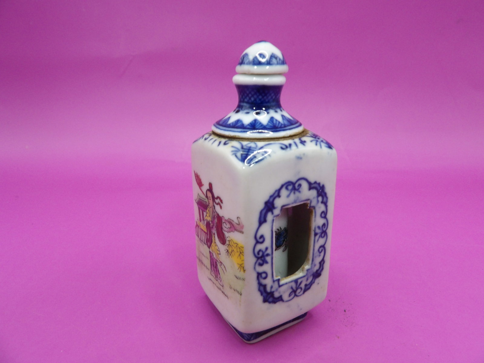 leaf mark Chinese porcelain snuff bottle with hand painted lotus and Chinese calligraphy: 3 inches height.
