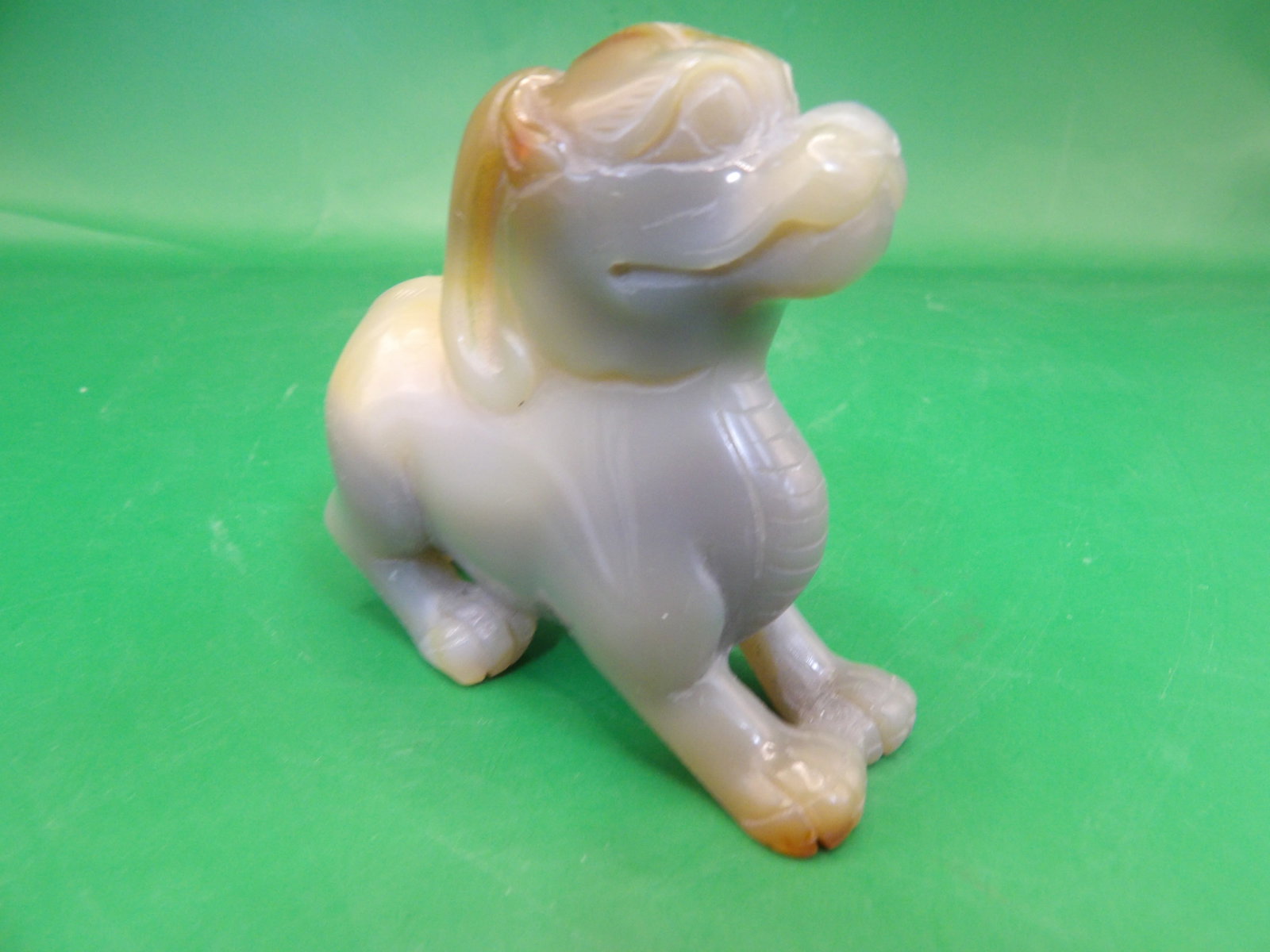 Chinese carved jade or agate mythical beast figurine: 2.6 inches long. 104 grams.