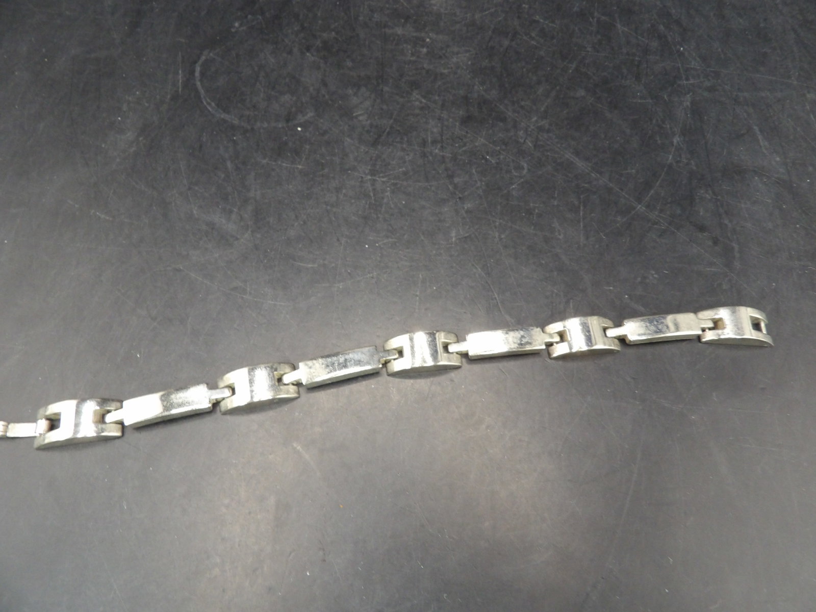 stamped 925 sterling silver rectangular segments link bracelet: 7.25 length. 36 grams.