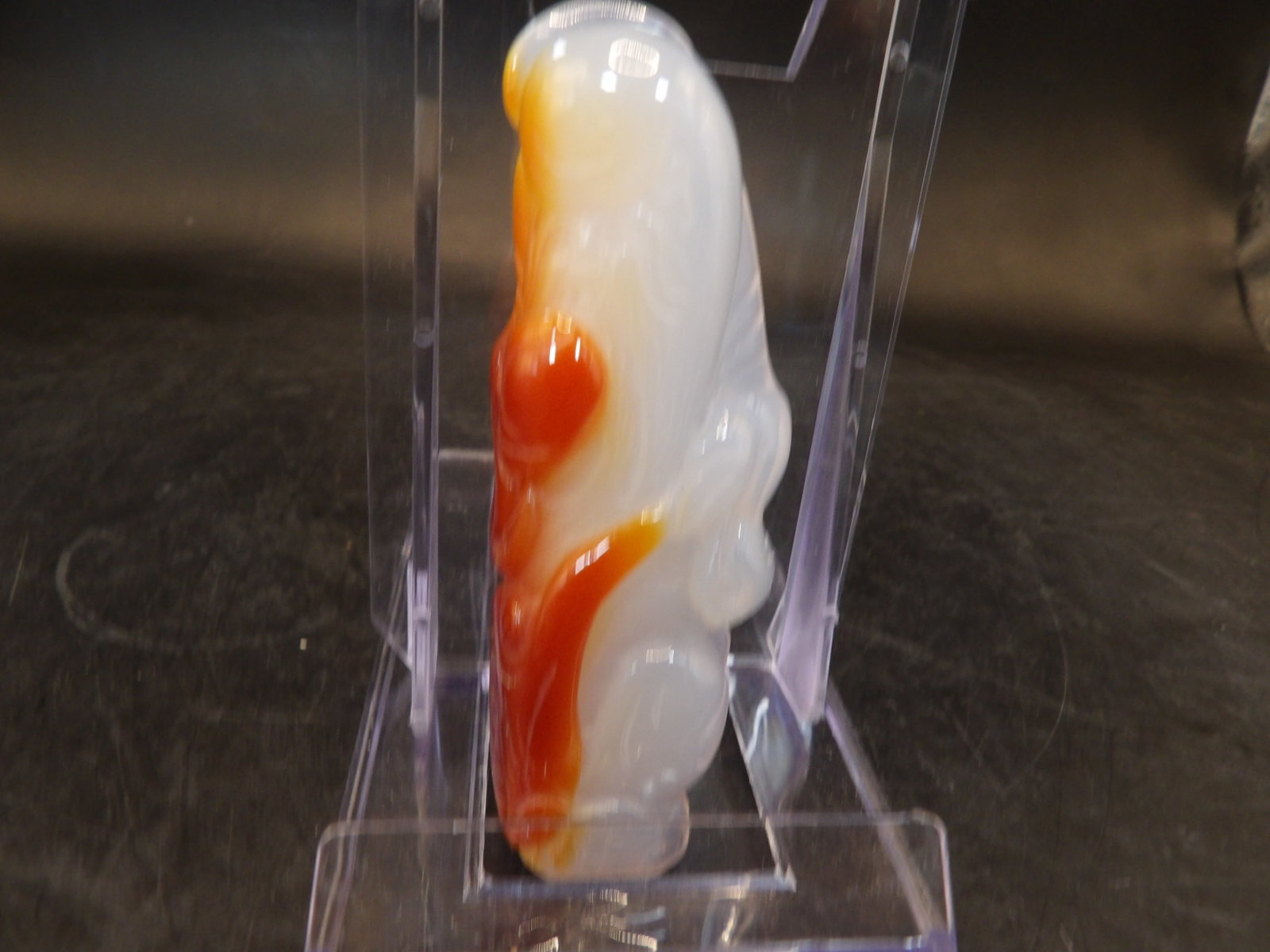 Chinese agate or stone carved long pendant depicting Longevity God: 3.2 inches height. 58 grams.
