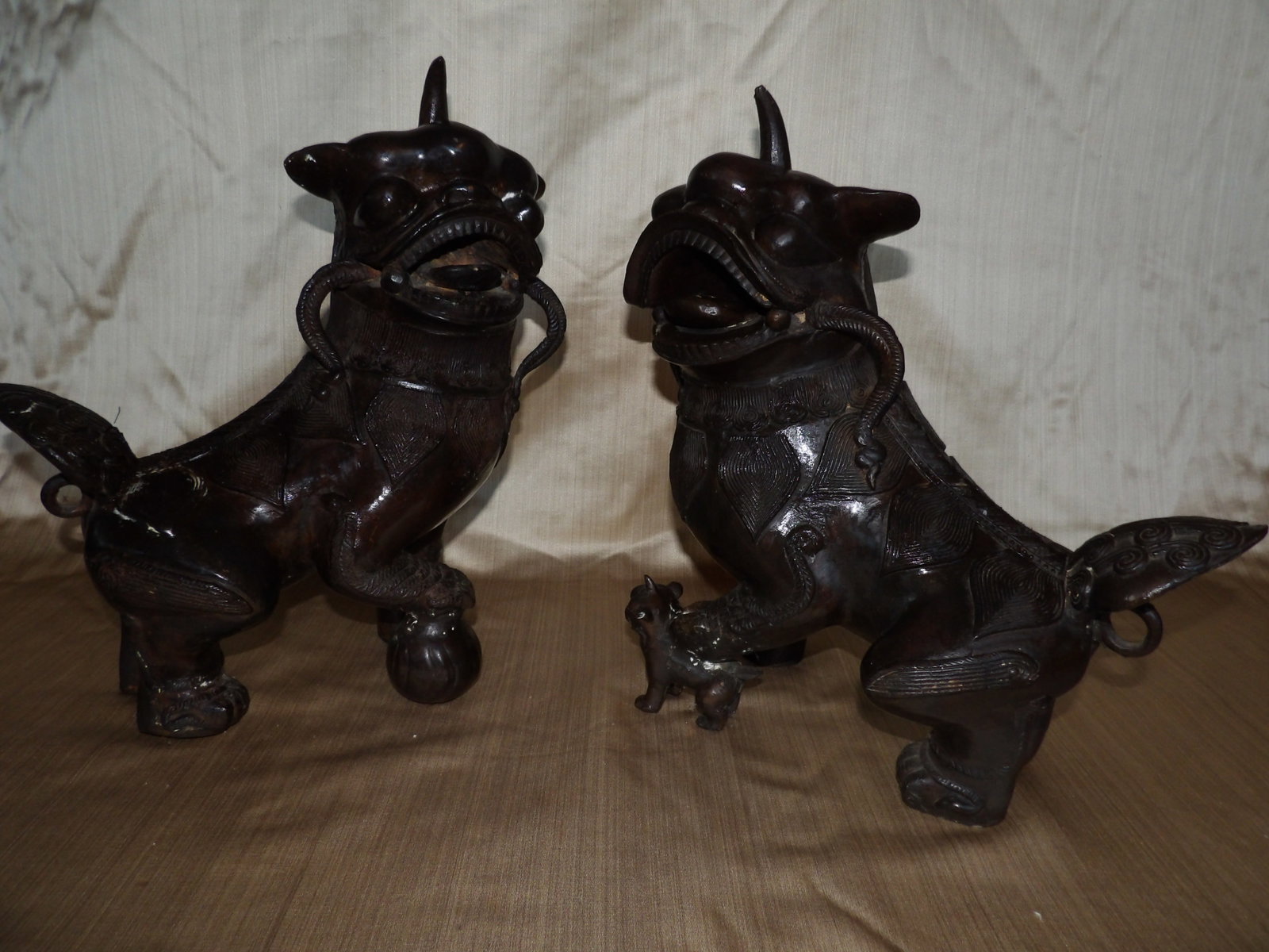 Chinese Large Pair of Bronze Foo Dog Guardian Lions Statues: Size is approx. 16 x 15 x 8 inches. Lot of 2. Male and female guardian lions. We will inhouse ship items to you very affordable and efficient. Select self-arrange shipping.