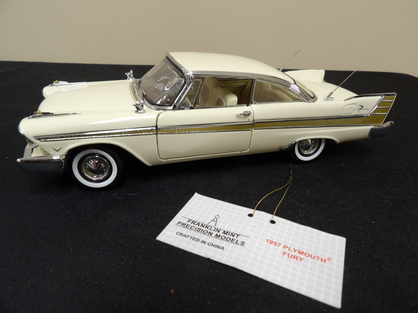 Franklin Mint Precision 1957 Plymouth Fury diecast model: 8.5 inches length.