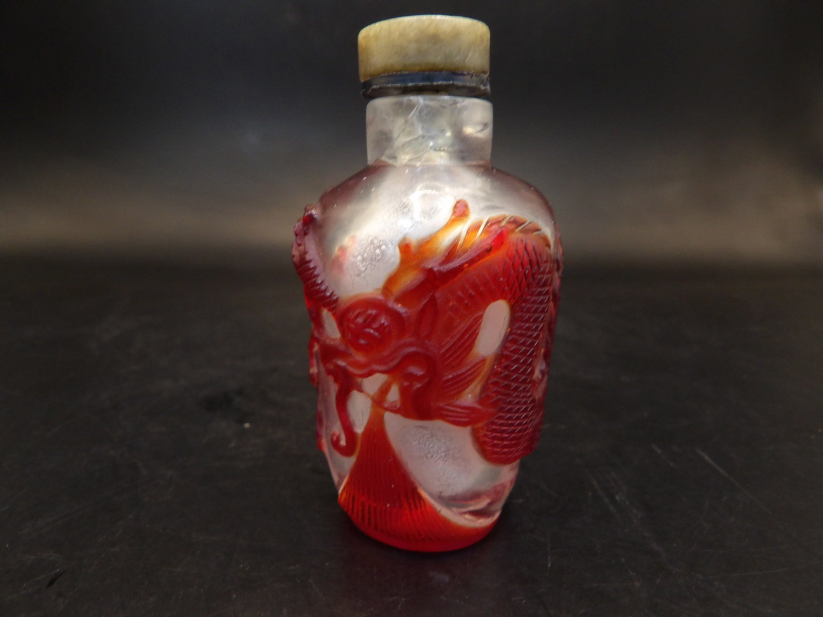 Chinese antique glass snuff bottle with red overlay dragon: 2.5 inches height.
