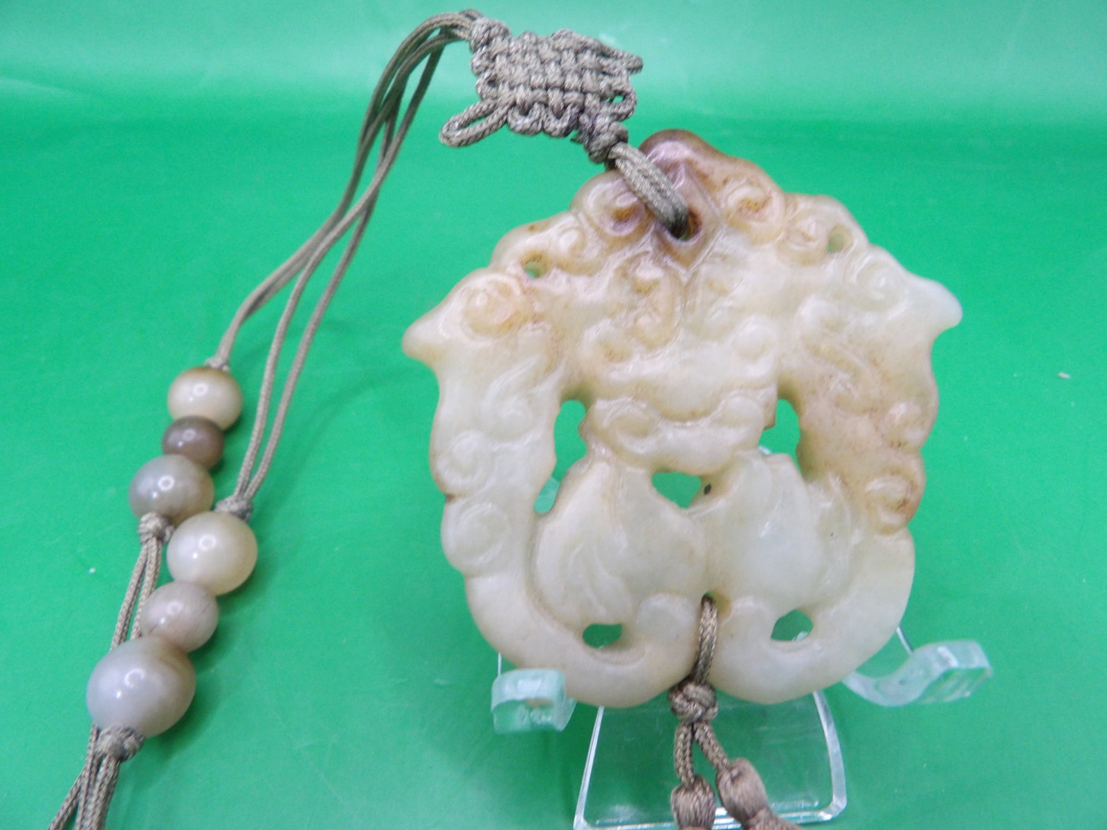 Chinese jade carved mythical creature pendant with tassel necklace: Pendant is 2 inches height. Approx. 34 grams.