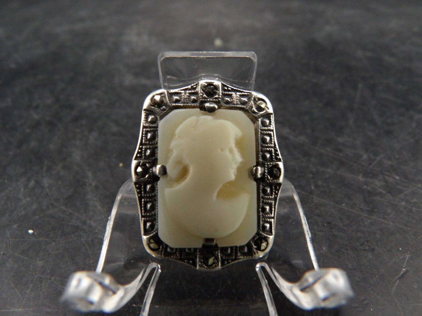 sterling carved shell cameo ring with marcasite accents: Circa 1920s. Size 6.