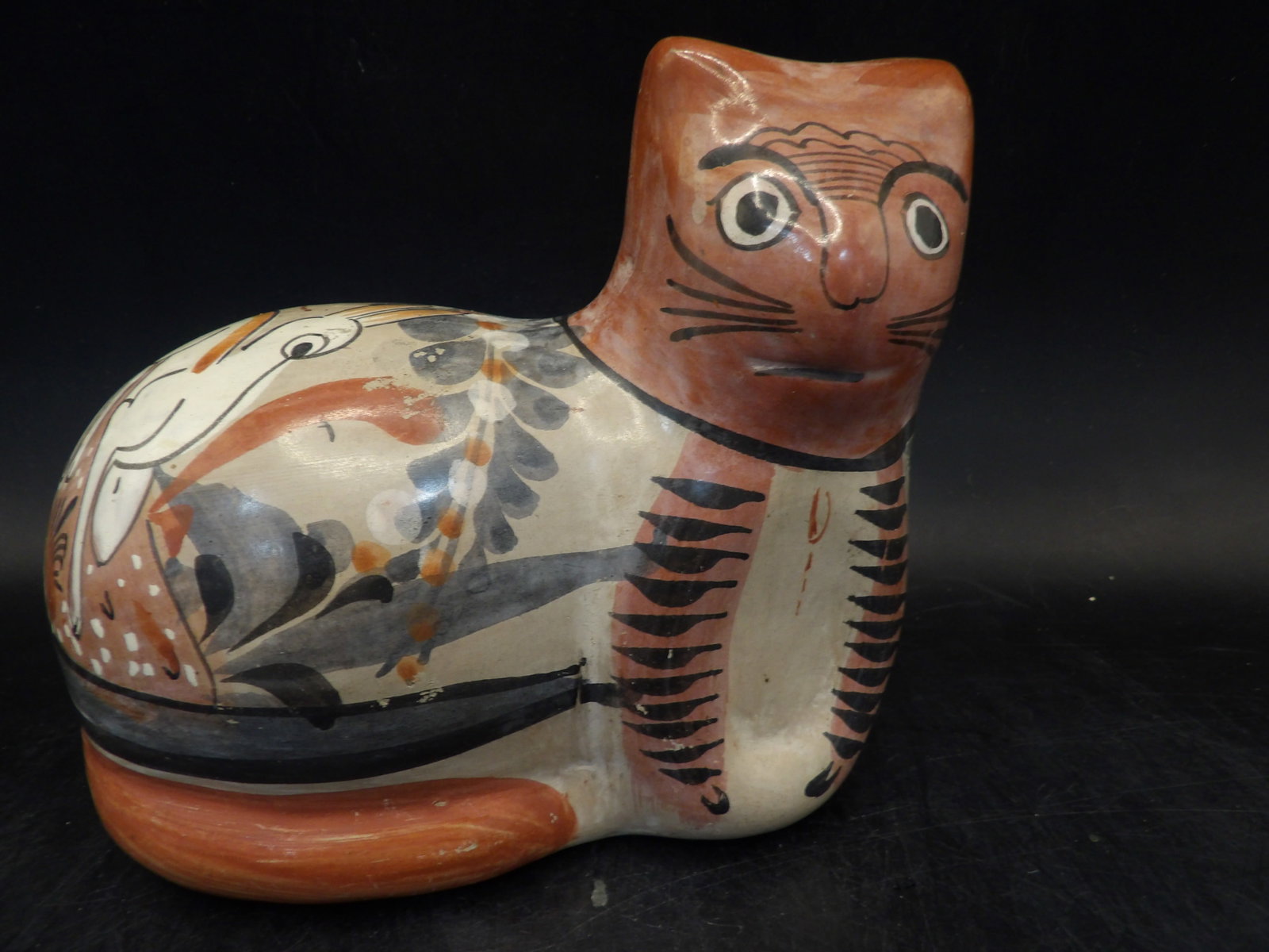 hand painted Tonala Mexican pottery cat sculpture: 5.5 inches length.