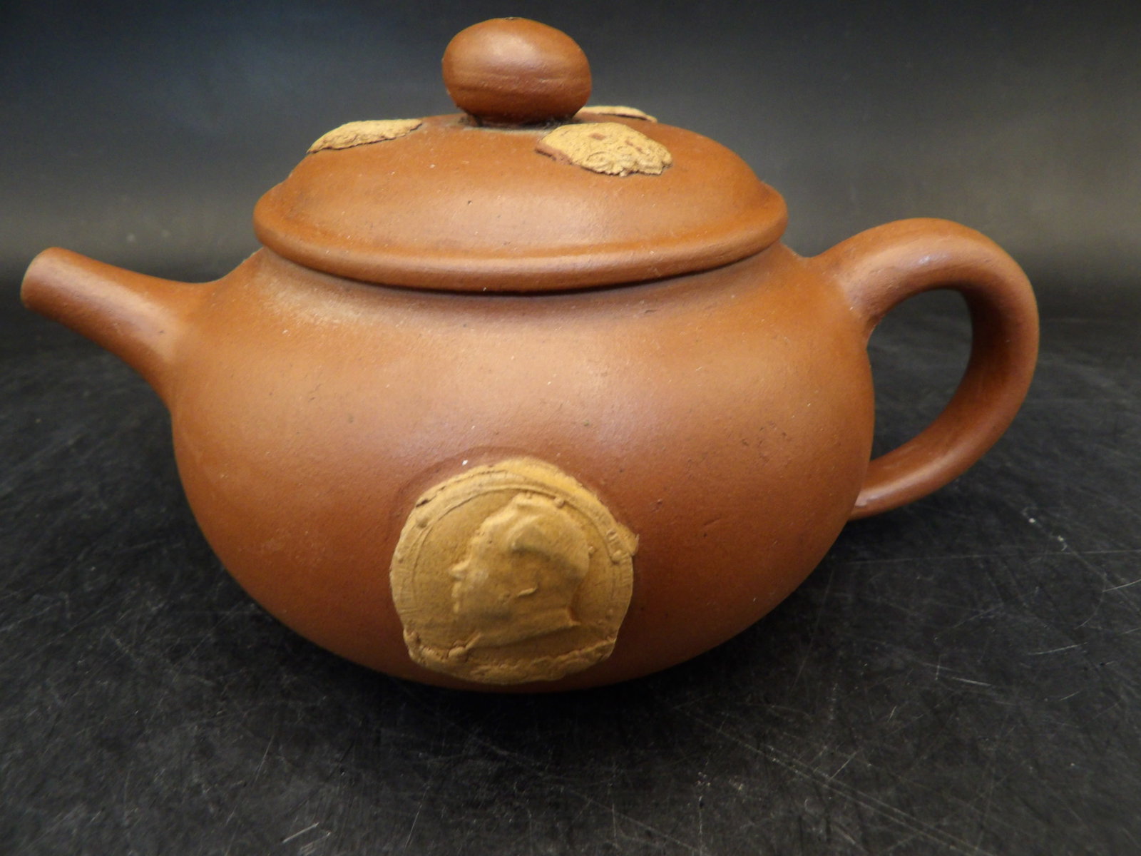 Chinese Yixing teapot with Chairman Mao motif signed: 5.2 inches length.