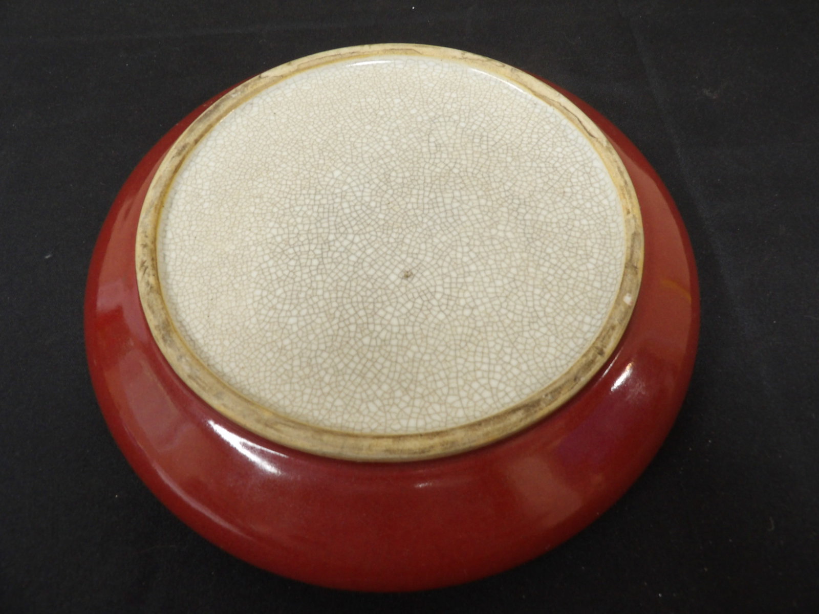 Chinese red glazed porcelain large brush pot or shallow bowl with crackled bottom finish: Size is 9.5 x 9.5 x 2.1 inches.