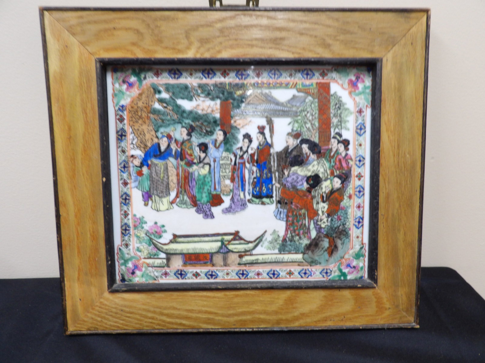 framed late 19th century Chinese famille verte porcelain plaque with figural scene: Frame size is approx 15.5 x 13.7 x 0.8 inches.