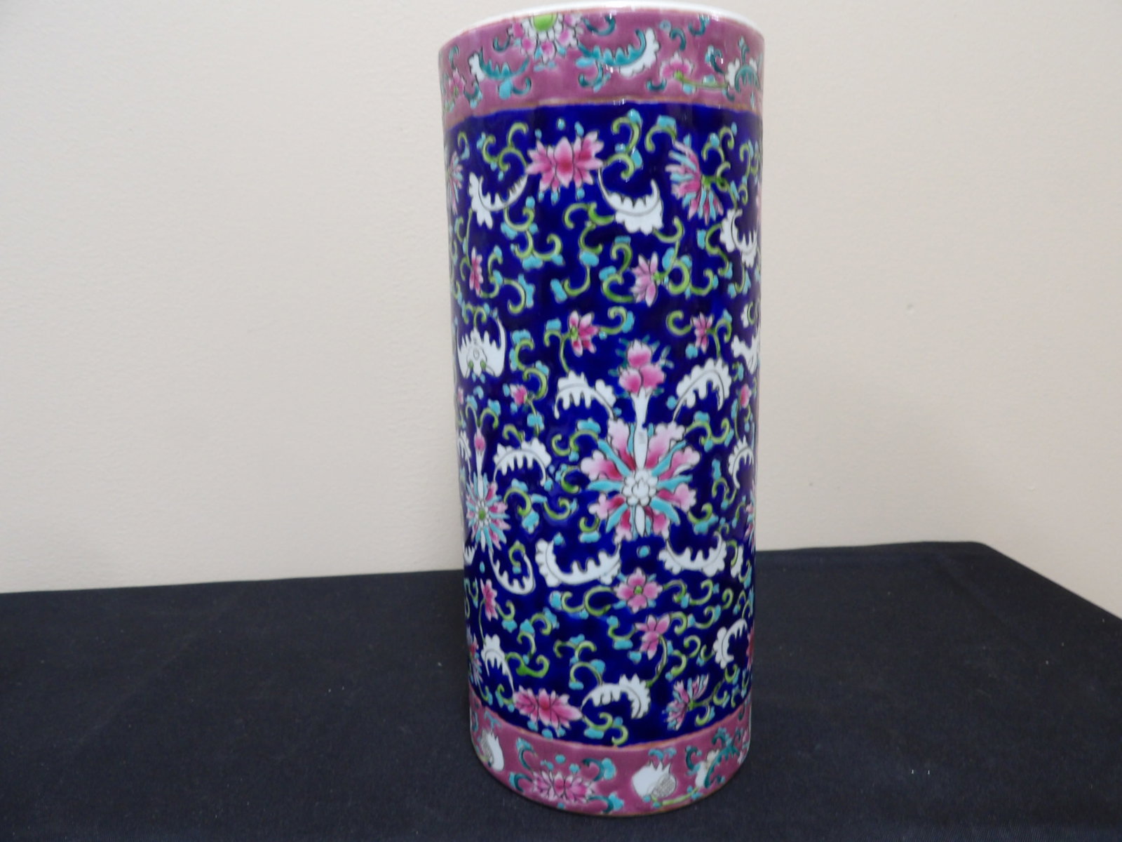Chinese famille rose porcelain hat stand or vase with floral motifs and Qing dynasty Tongzhi mark: 11 inches height.