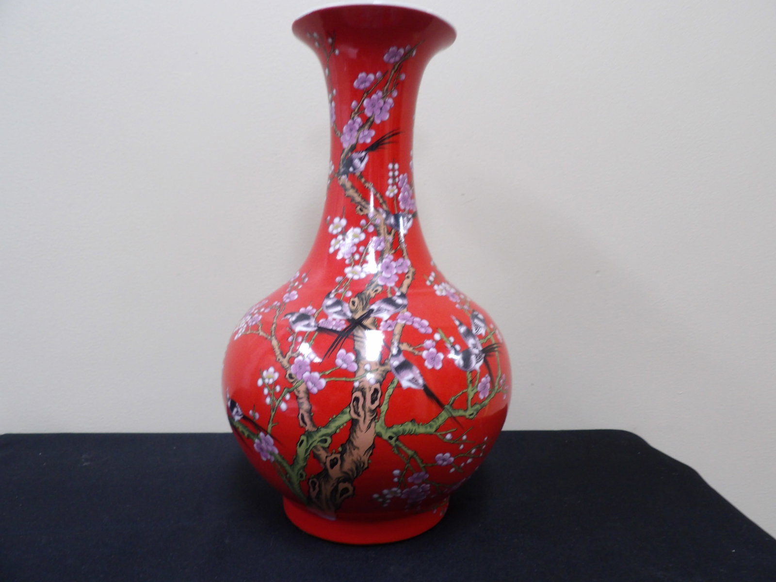 Chinese red glazed porcelain vase with birds plum blossom and Chinese calligraphy: Over 14 inches height.