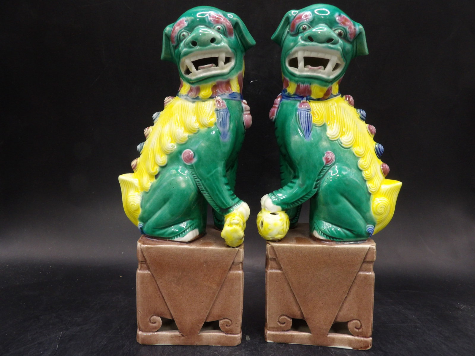 pair of Chinese ceramic foo dog statues: Approx. 8 inches height.