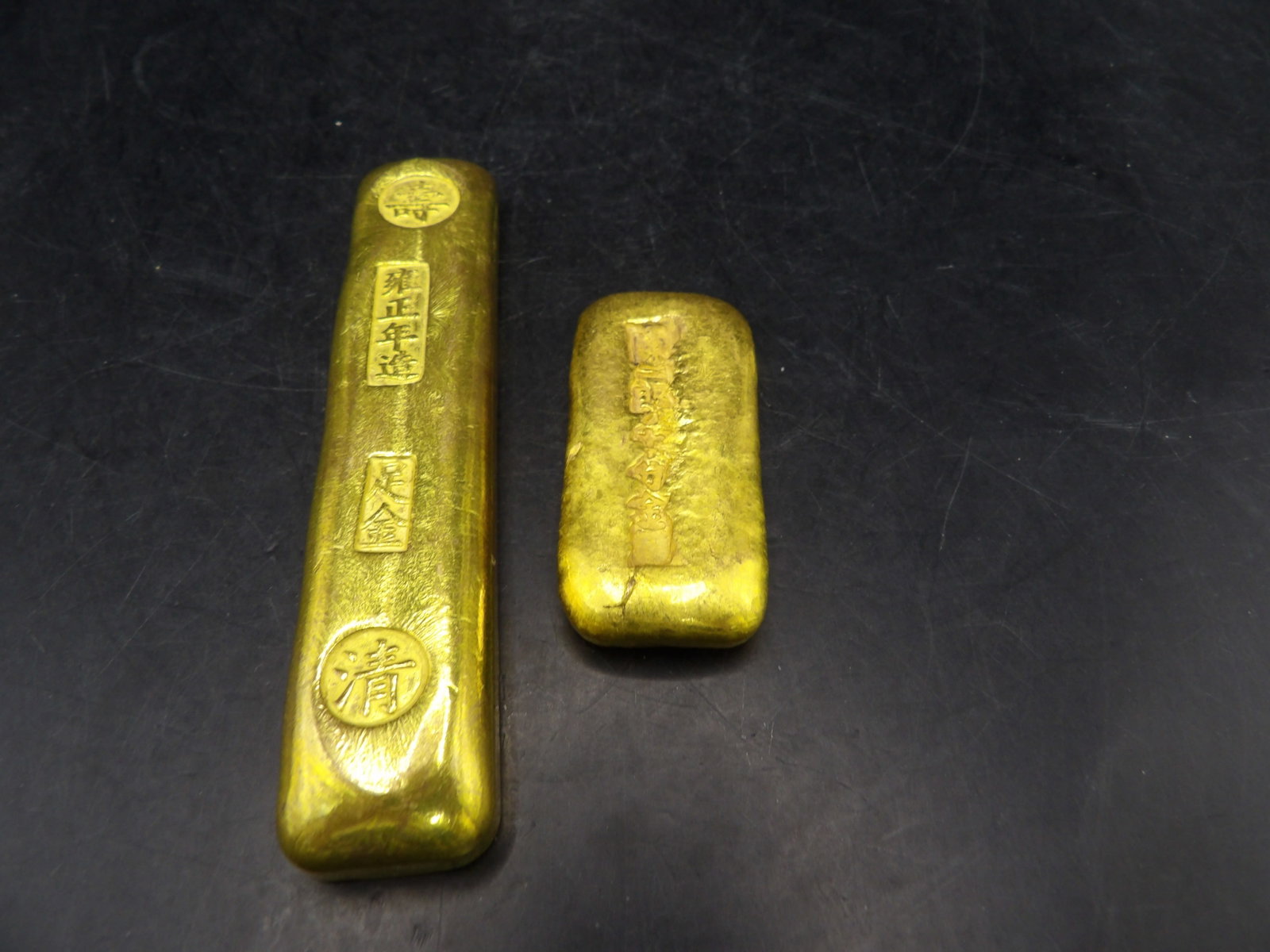 lot of 2 Chinese gold gilt metal ingots: Longer one is 3.8 inches height.