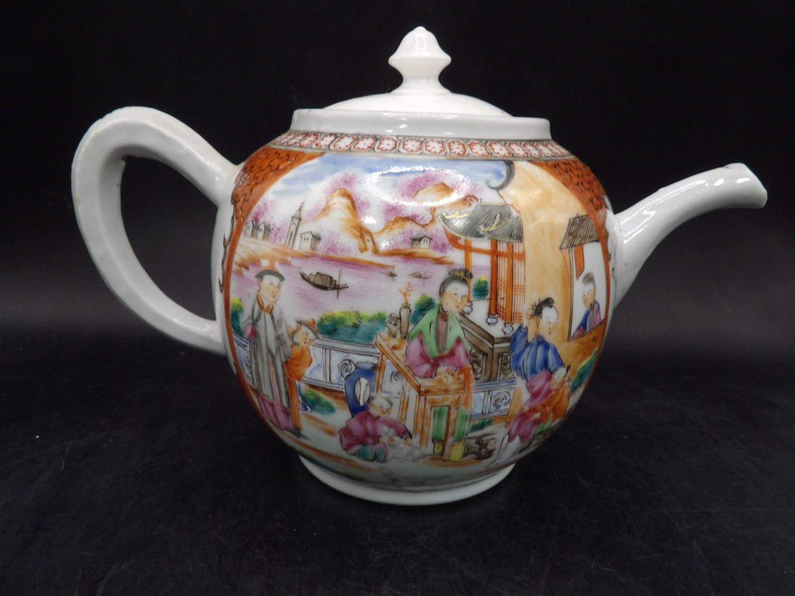 18th century Chinese famille rose porcelain teapot with figural enamel deco: 9 inches length including handles.