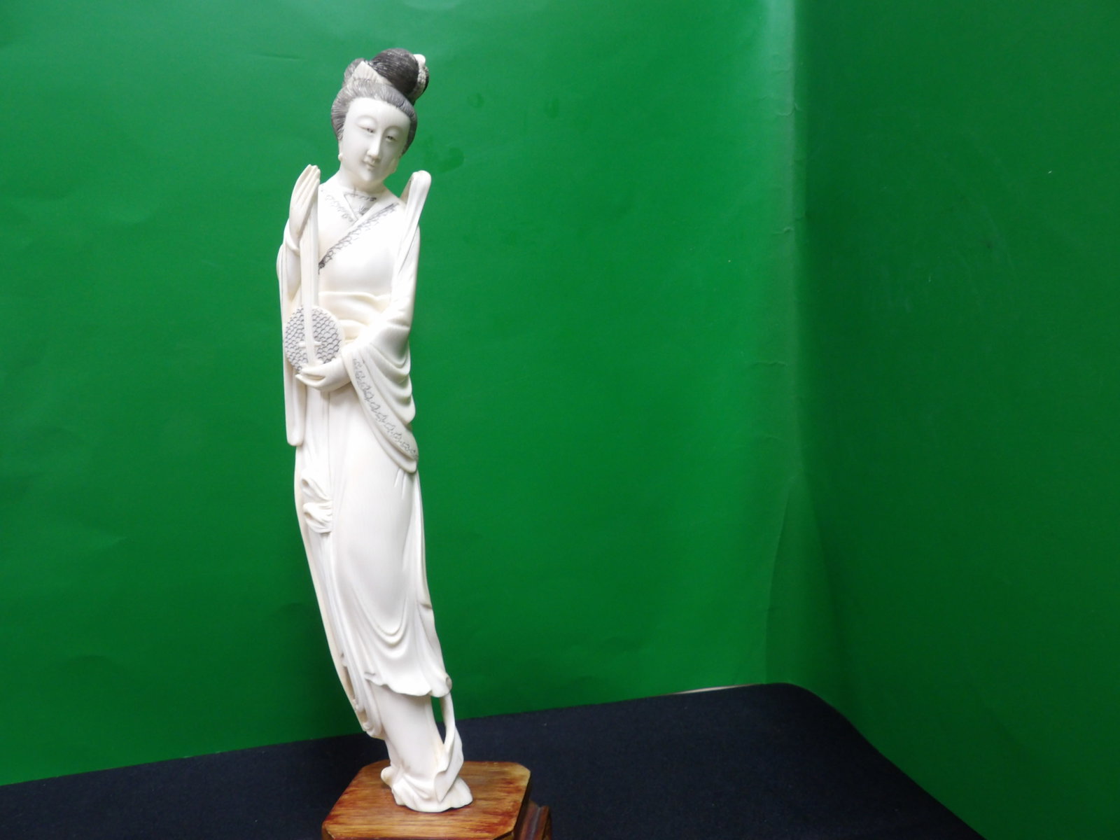 tall antique Chinese or Japanese carved a lady holding musical instrument statue: Statue is close to 12 inches height. 13.7 inches height including wooden base. No international shipping.