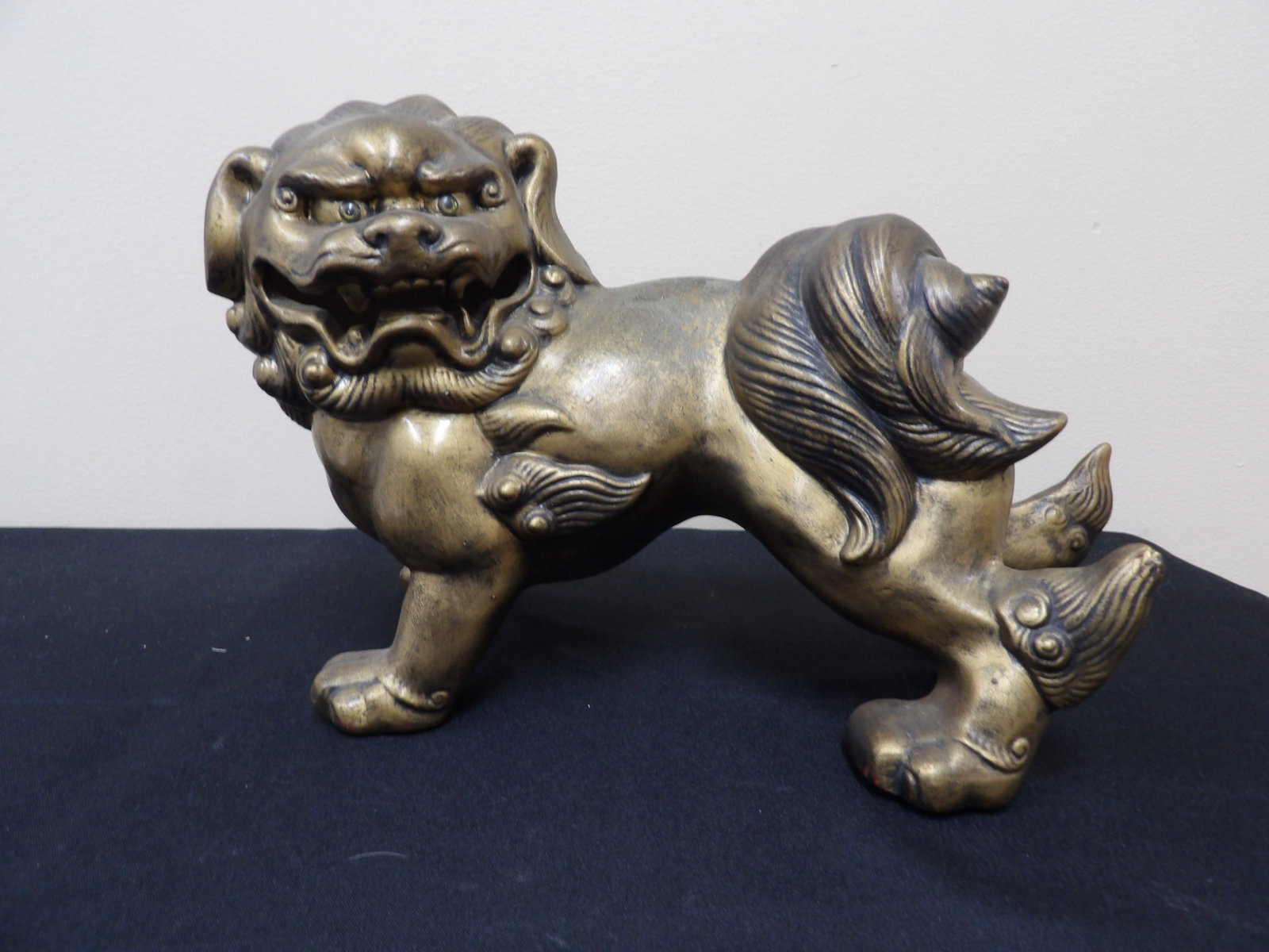 vintage Chinese or Japanese ceramic guardian lion statue: Approx. 12 inches length.