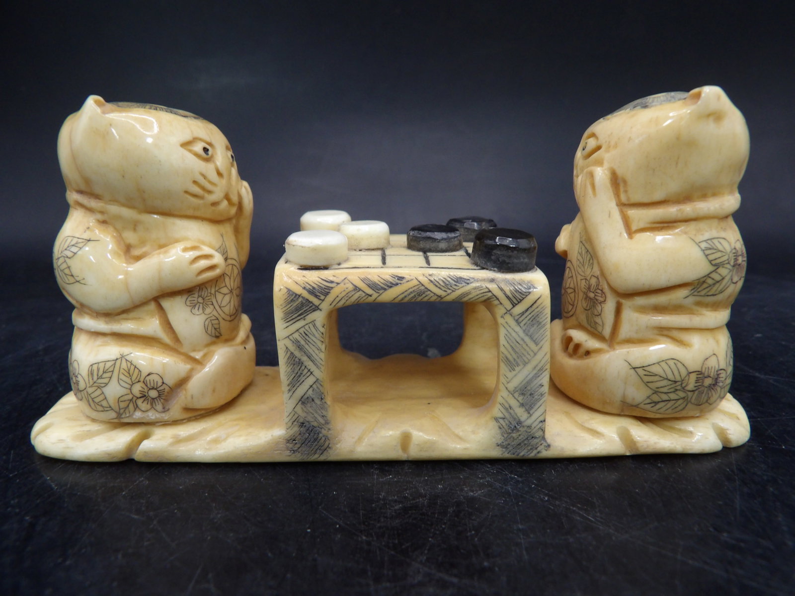 bone carved figurine of cats playing Go in padded box: 4.3 inches length.