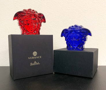 Two Versace Medusa Glass Paperweights: Two Versace Medusa Glass Paperweights For Rosenthal, One Red, One Blue, Each Marked Rosenthal Versace Underside, 4 X 5.5 X 3 Inches, With Original Boxes 4 X 6.5 X 6.5 Inches, Scuffed Boxes. See