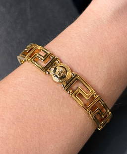 Versace Medusa Greca Cuff Bracelet: Versace Medusa Greca Cuff Bracelet. Gold Tone Metal, Fits Up To 8 Inch Wrist. Gold Tone Metal. Stamped Versace Made In Italy. Currently $595 At Retail. See Photos For Condition.