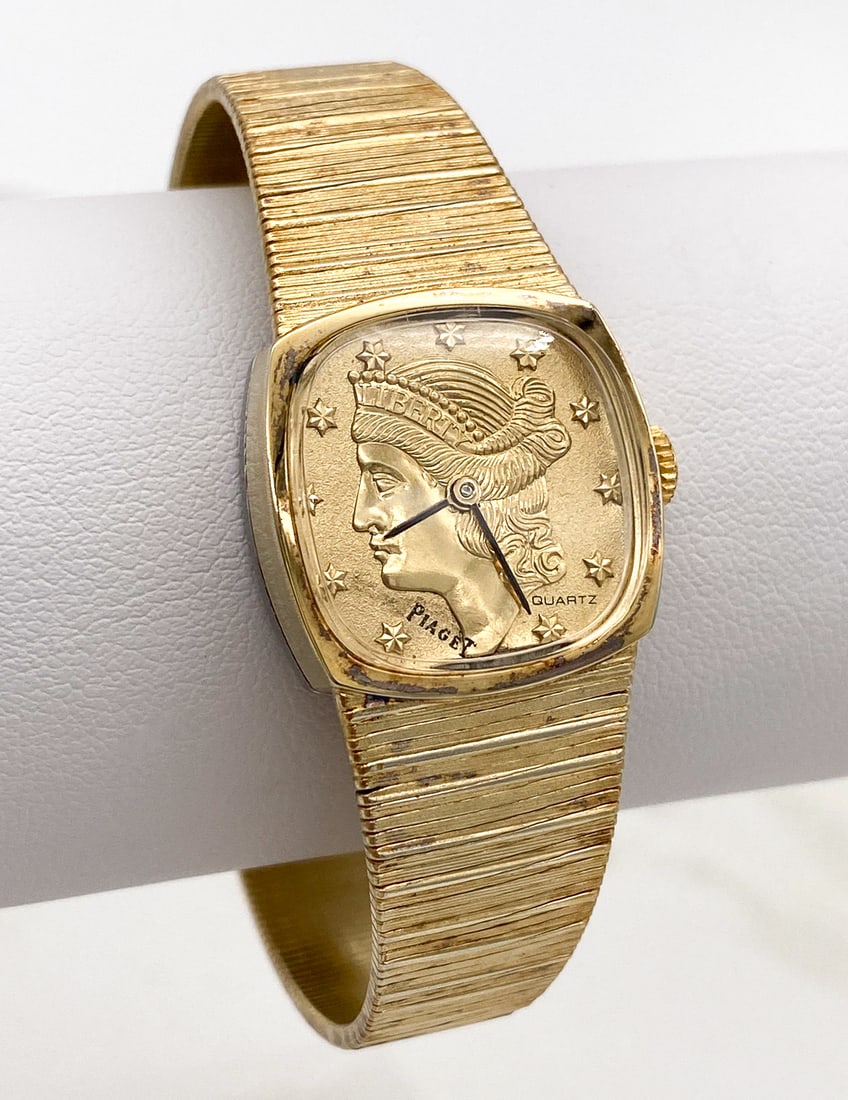 Piaget Coin Face Wristwatch: Piaget Coin Face Wristwatch, Gold Plated Band. Weight 7 3/4 Inches Long, Adjustable Clasp Marked Italy.