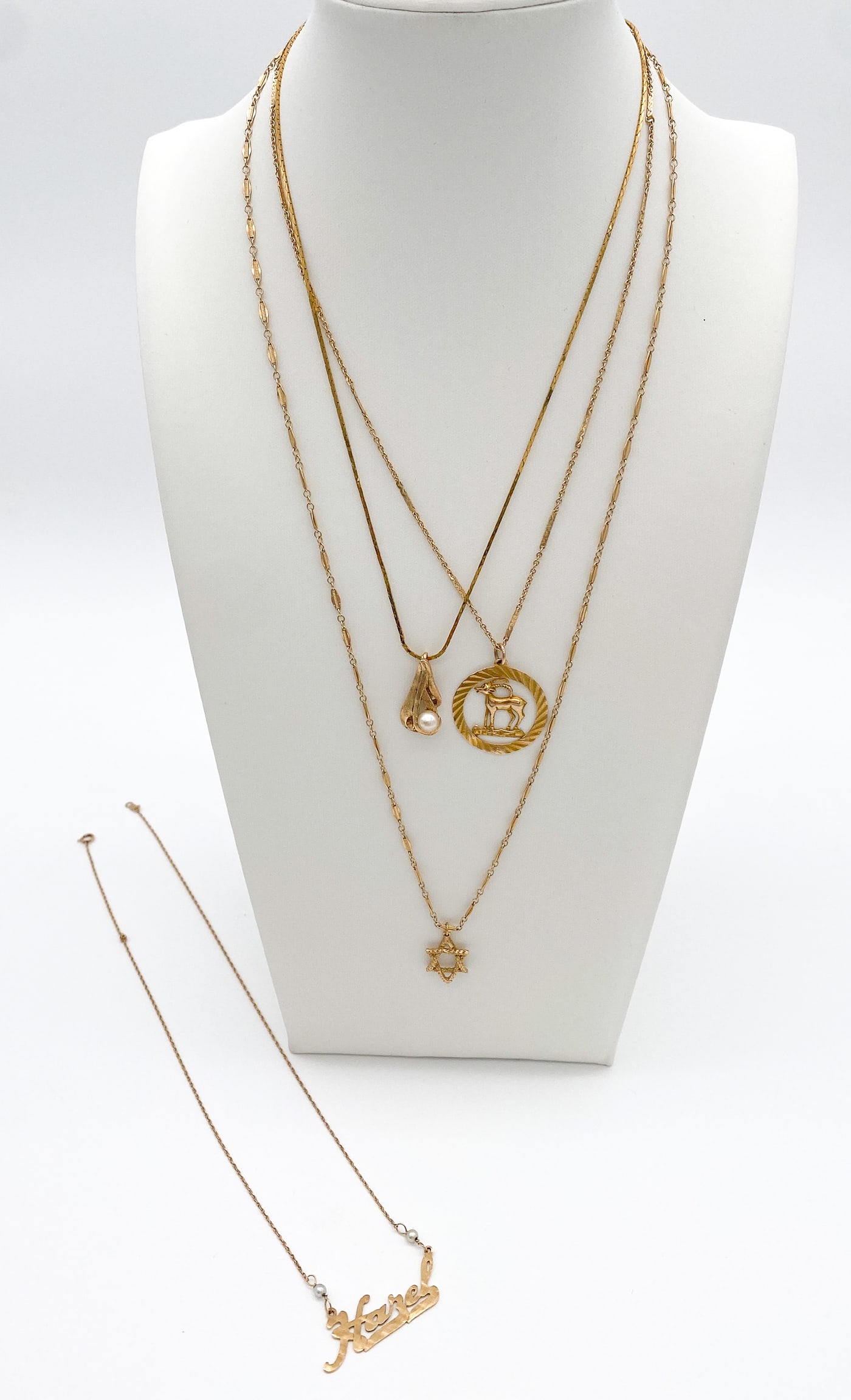 Four Yellow Gold Pendants & Chains (1 of 3)